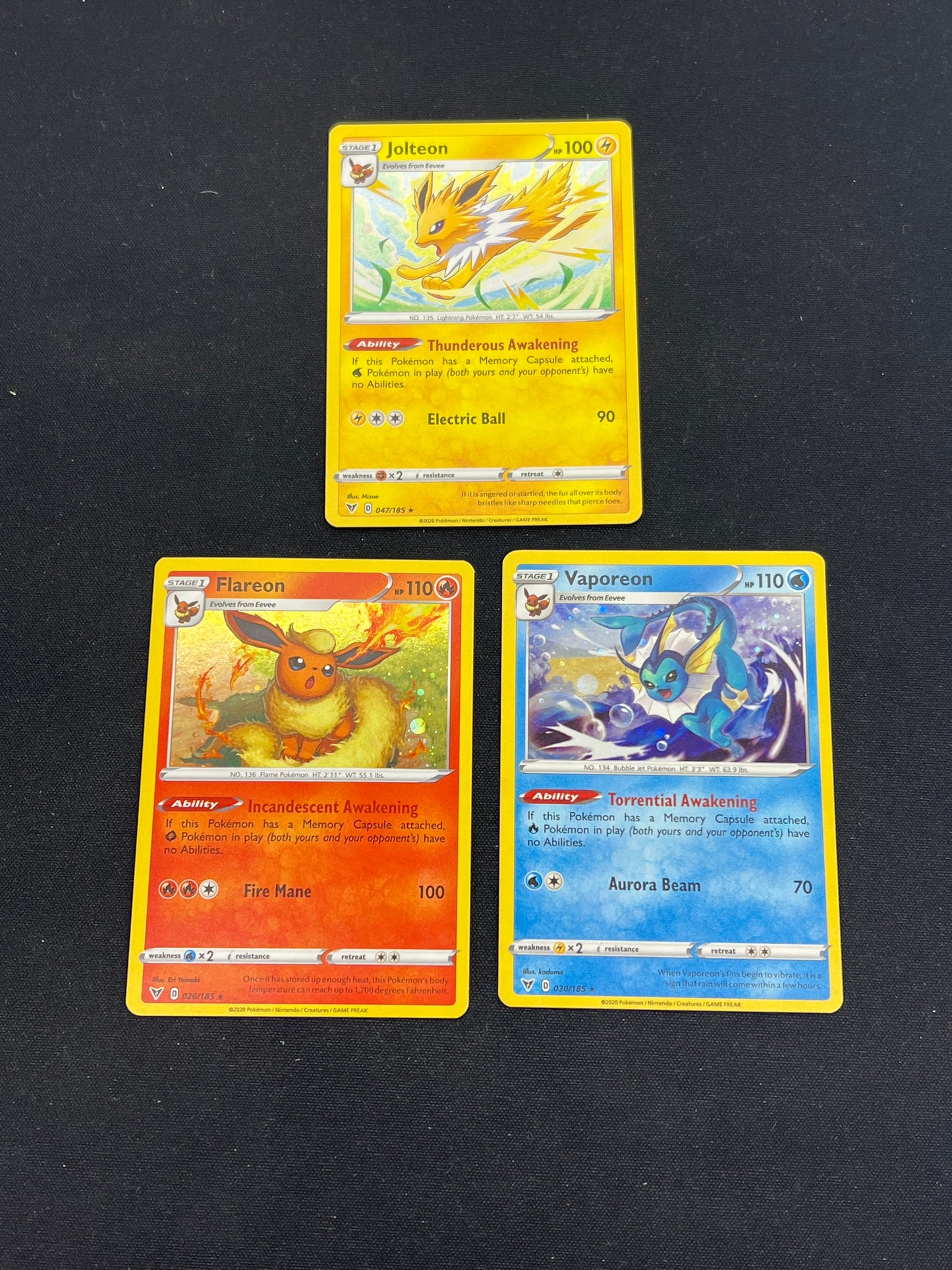 Auction Lot 373: Pokemon Cards Lot of 3 Cosmo Holo Eeveelution Promos Conditions Vary