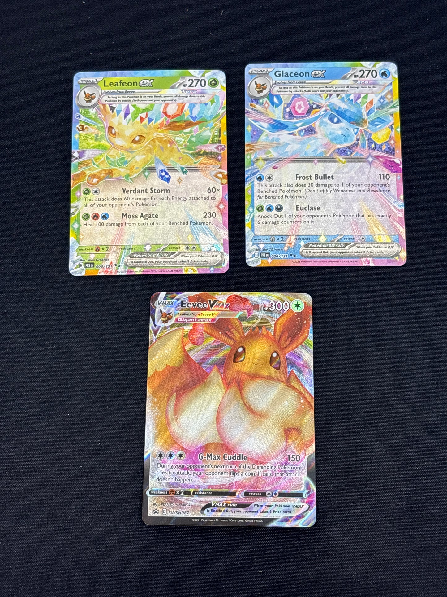 Auction Lot 394: Pokemon Cards Assorted Lot of 3 Eevee VMAX & Eeveelution EXs Conditions Vary