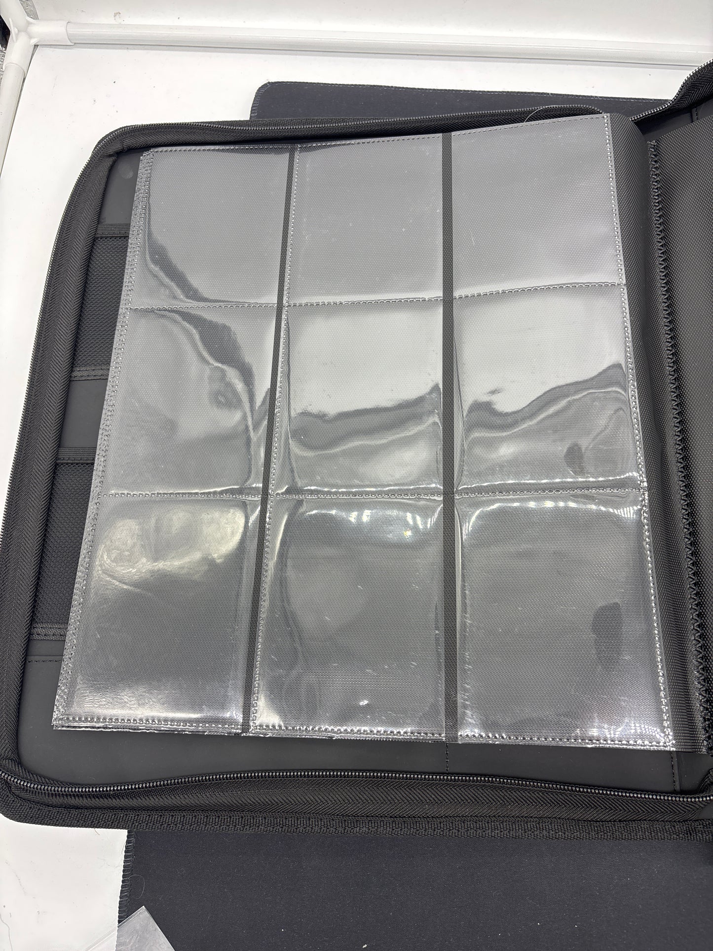 Auction Lot 350: EvoRetro 9 Pocket Toploader 216 Count Binder Rarely Used