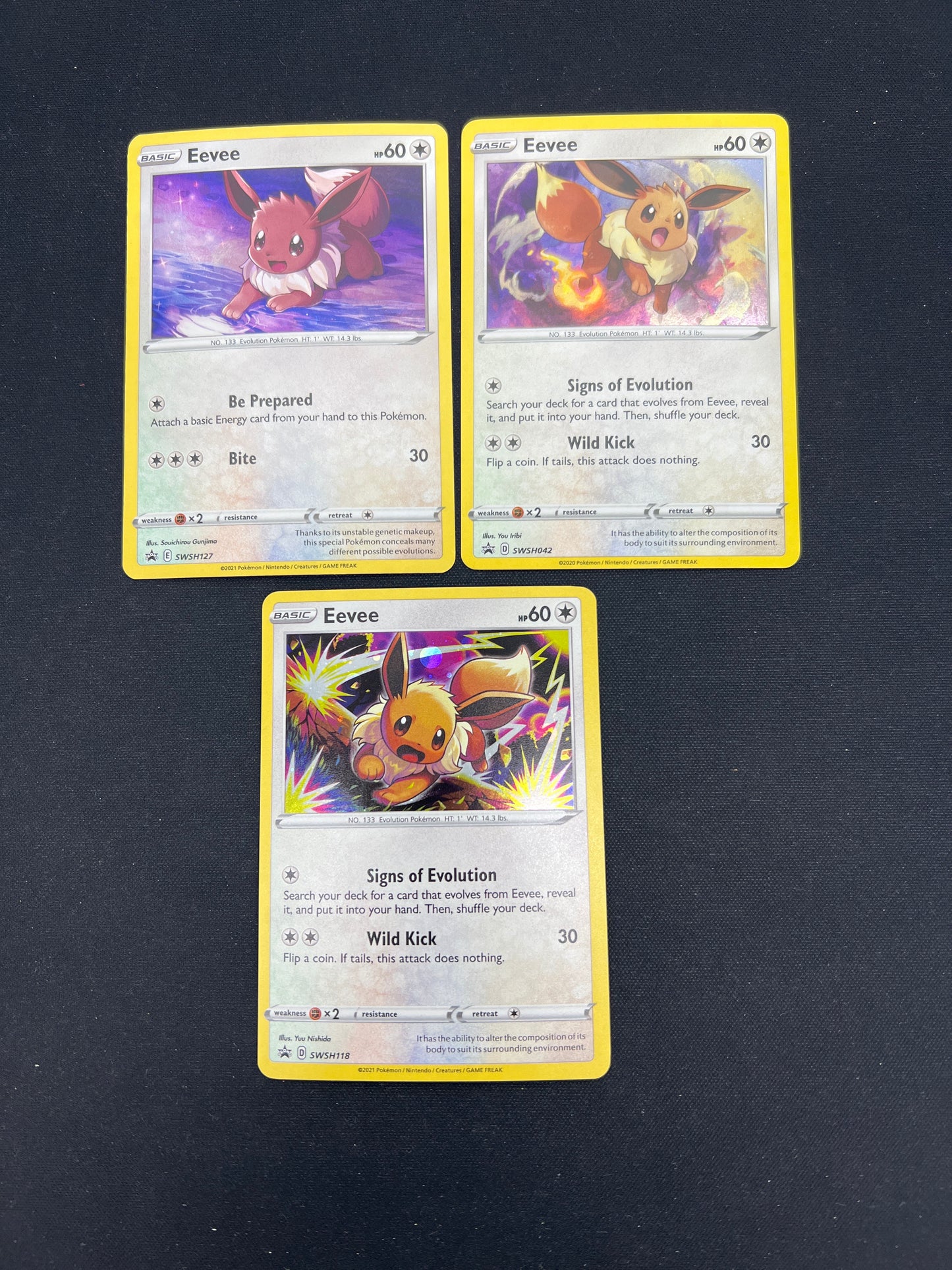 Auction Lot 126: Pokemon Cards Lot of 3 Eevee Cosmo Holos SWSH Promos Conditions Vary