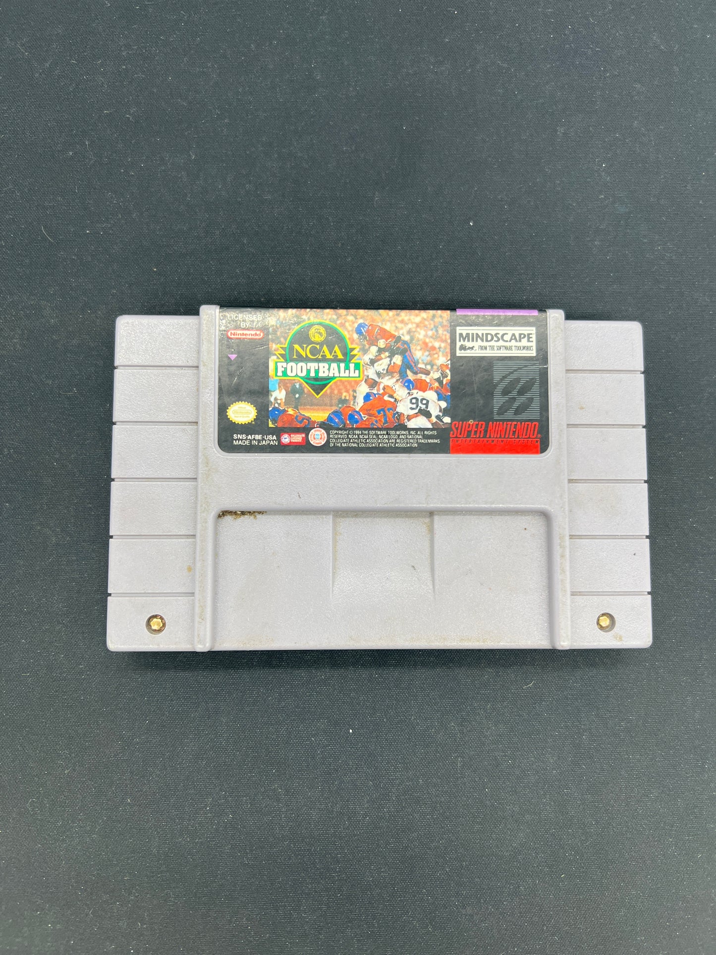 Auction Lot 221: SNES Video Game NCAA Football Loose
