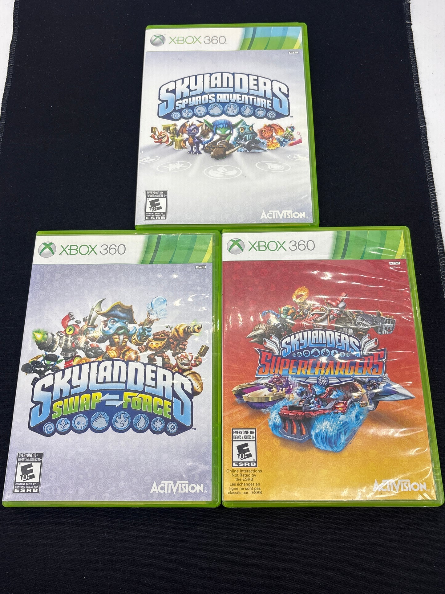 Auction Lot 213: XBOX 360 Video Game Lot of 3 Skylanders Spyro's Adventure Swap Force Super Chargers