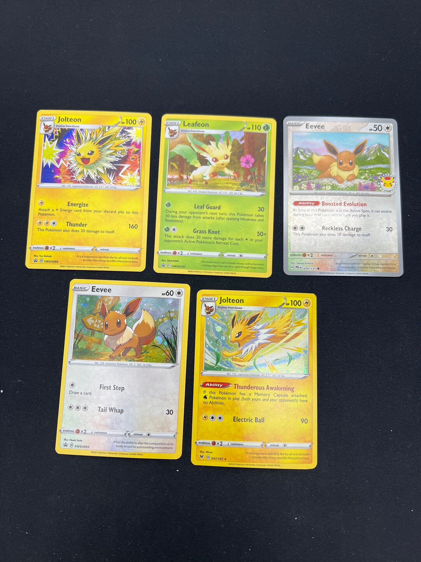 Auction Lot 70: Pokemon Cards Lot of 5 Eeveelution Cosmo Holo and Pokemon Day Stamped Reverse Holo Conditions Vary