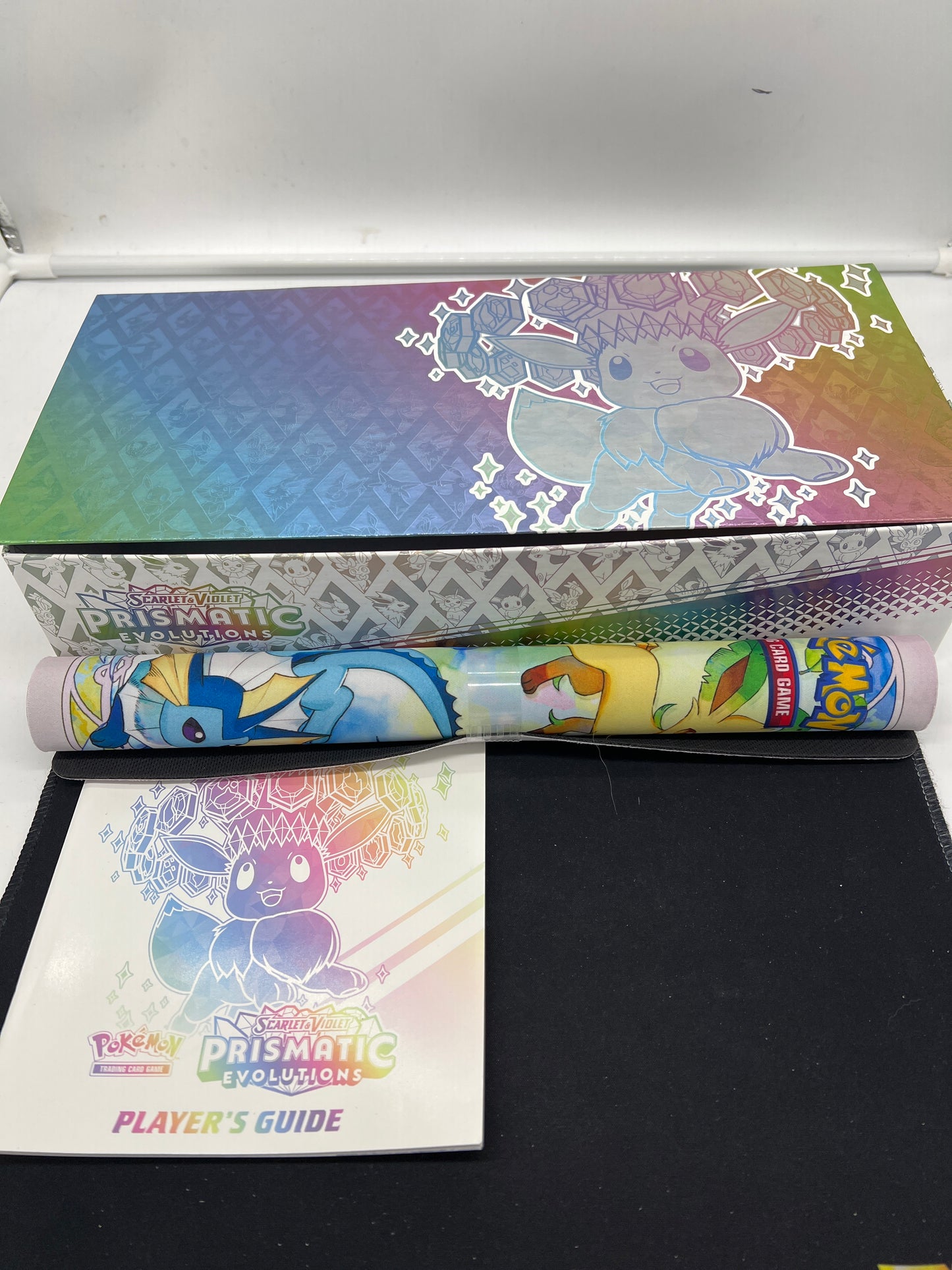 Auction Lot 278: Pokemon Prismatic Evolutions Super Premium EMPTY Box With Playmat & Player Guide