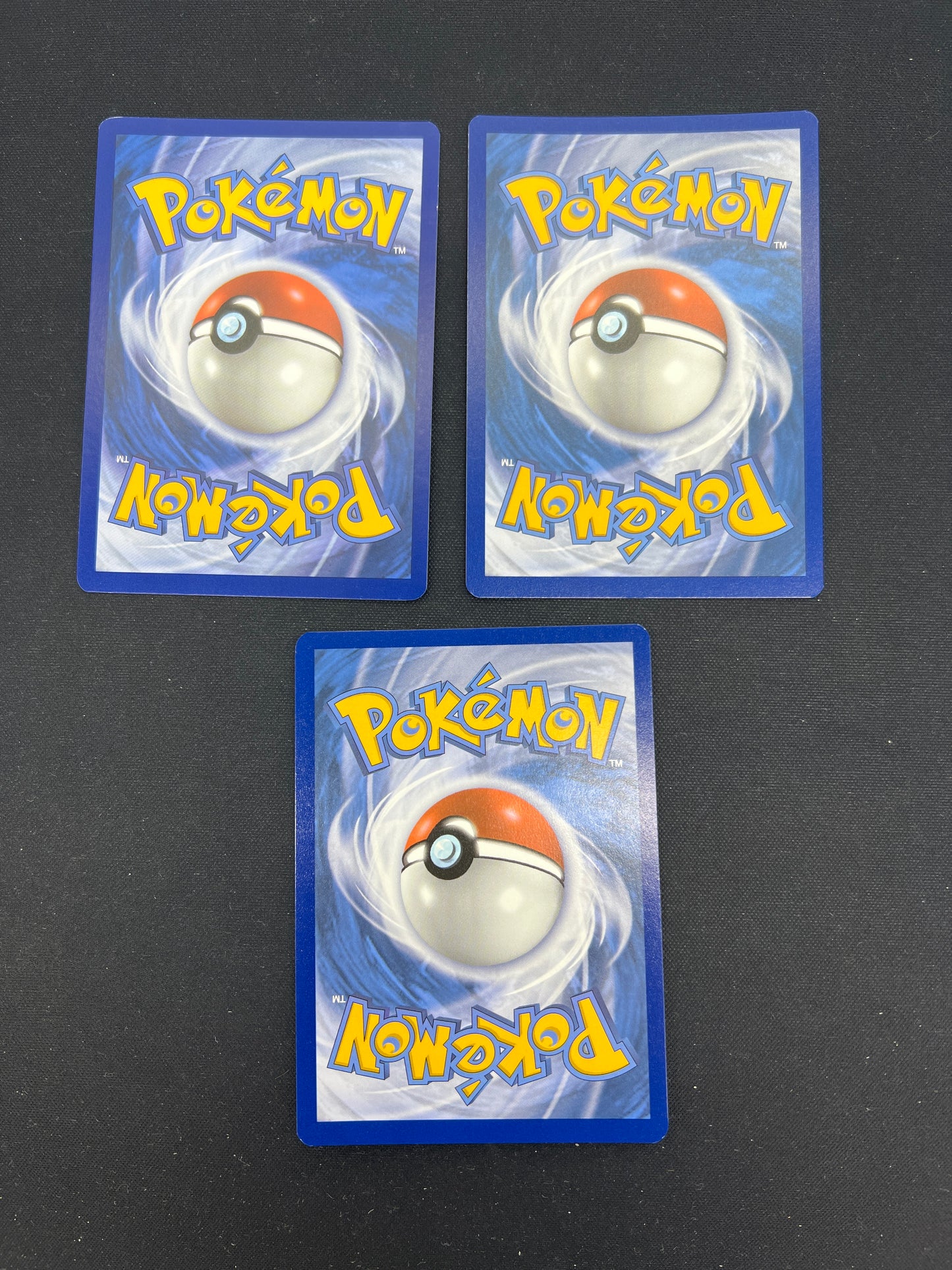 Auction Lot 104: Pokemon Cards Lot of 3 Assorted Cosmo Holos Conditions Vary