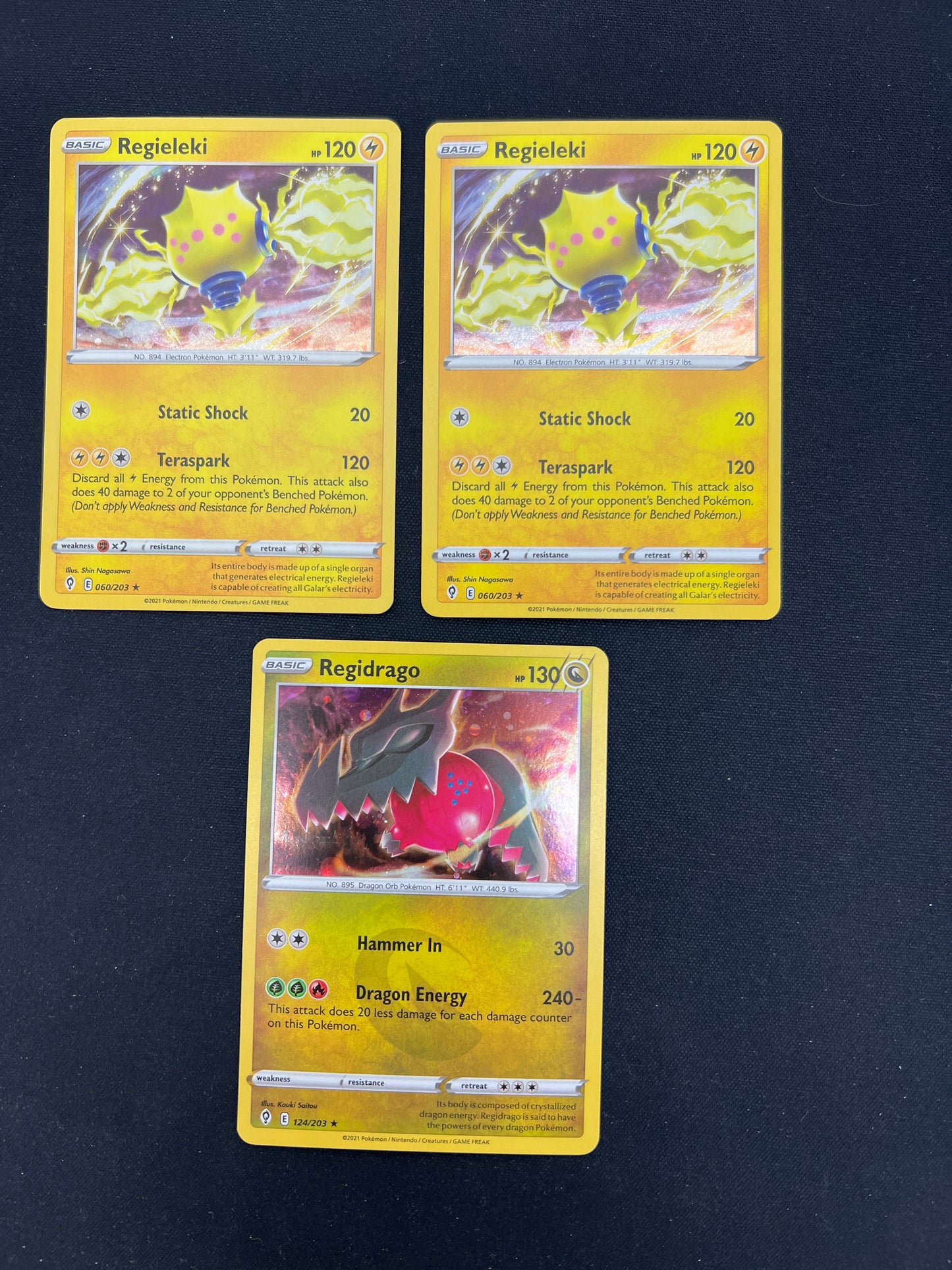 Auction Lot 82: Pokemon Cards Lot of 3 Regieleki and Regidragon Conditions Vary