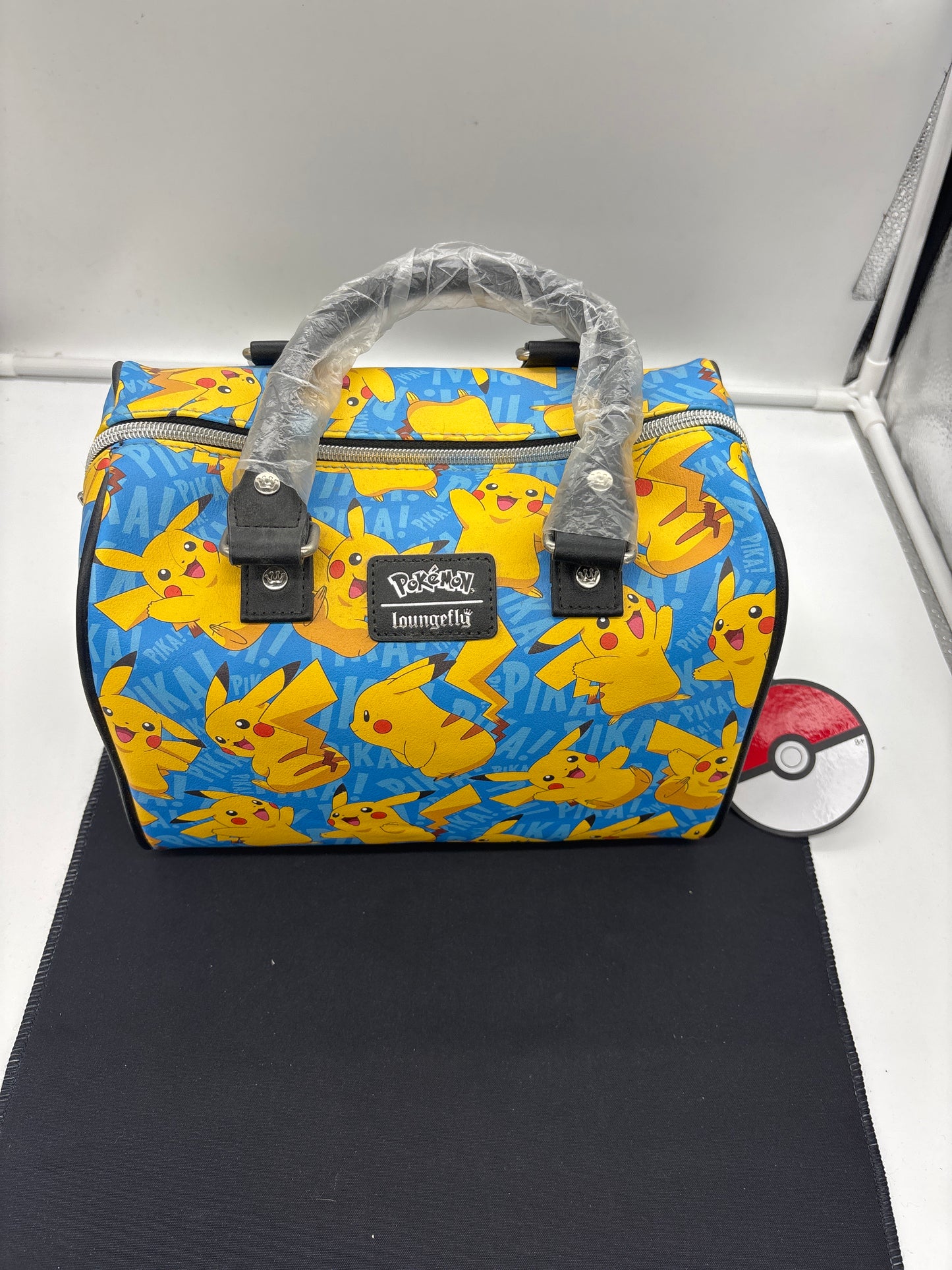 Auction Lot 33: Pokemon Loungefly Pikachu Leather Bag