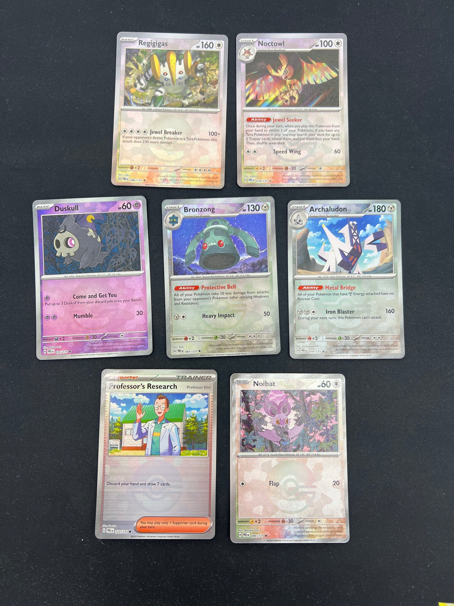 Auction Lot 337: Pokemon Cards Assorted Lot of 7 Pokeball Holos Prismatic Evolutions Conditions Vary