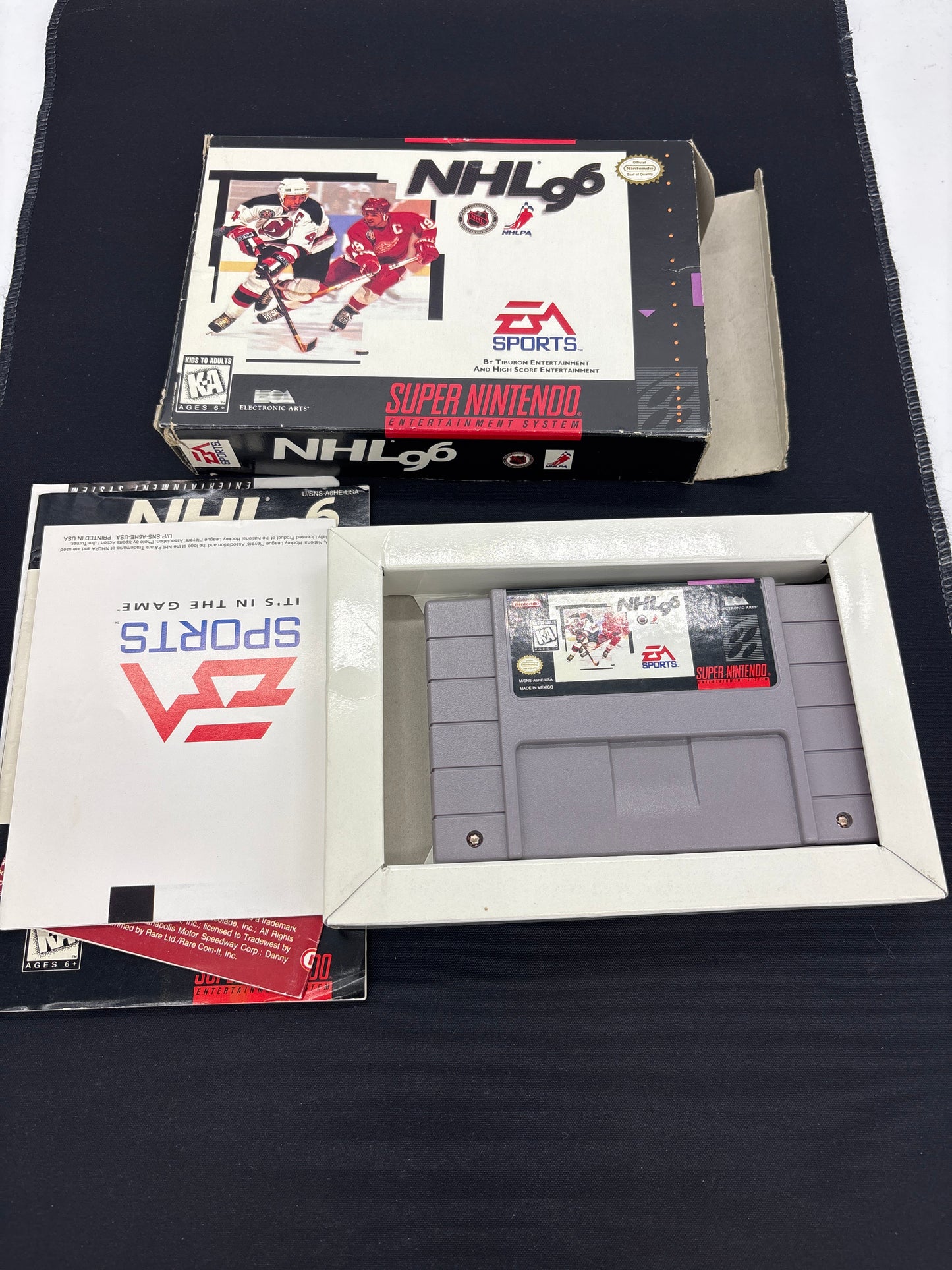 Auction Lot 101: SNES Video Game EA NHL '96 CIB