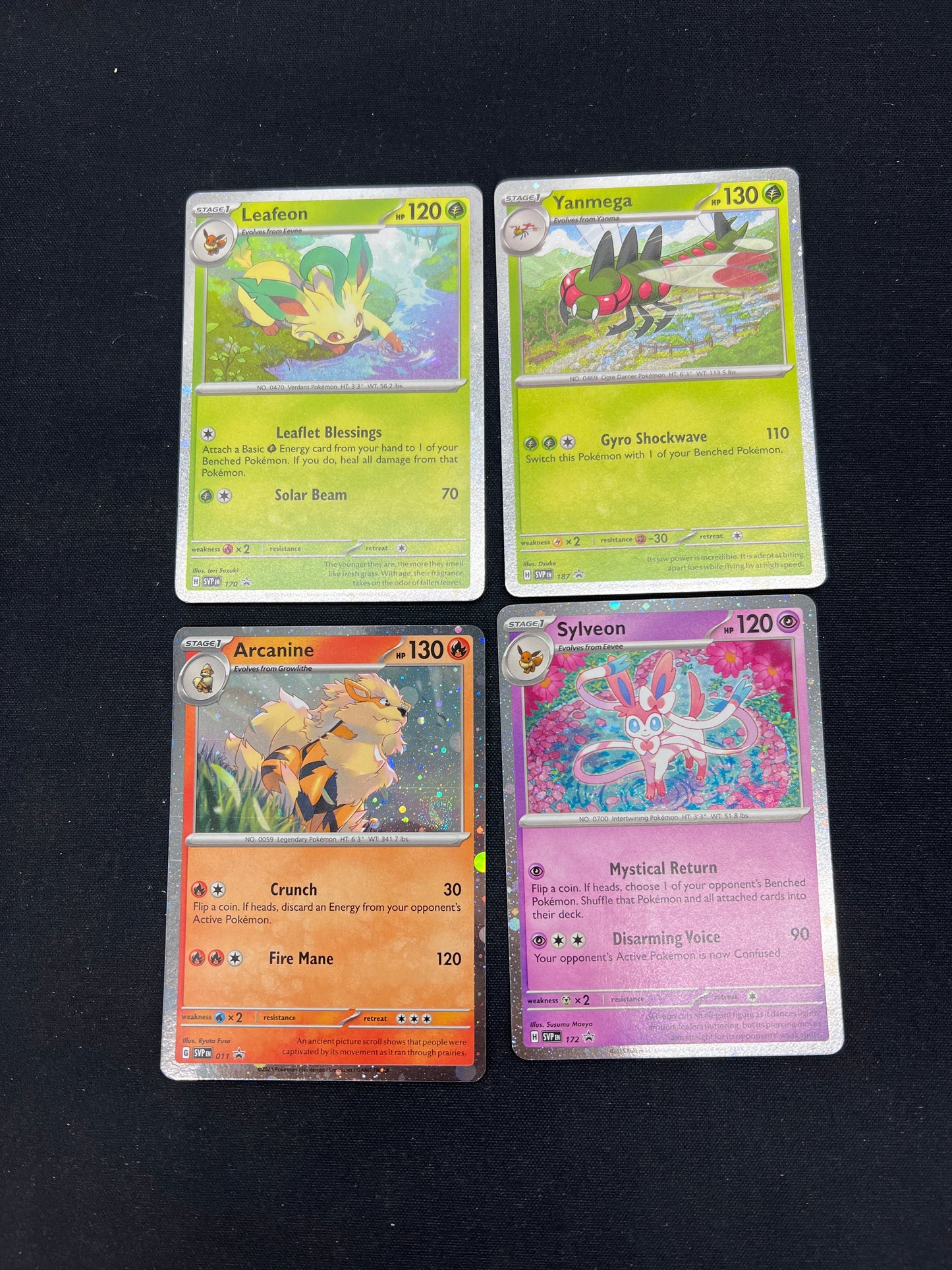 Auction Lot 269: Pokemon Cards Lot of 4 Assorted Cosmo Holos SV Conditions Vary