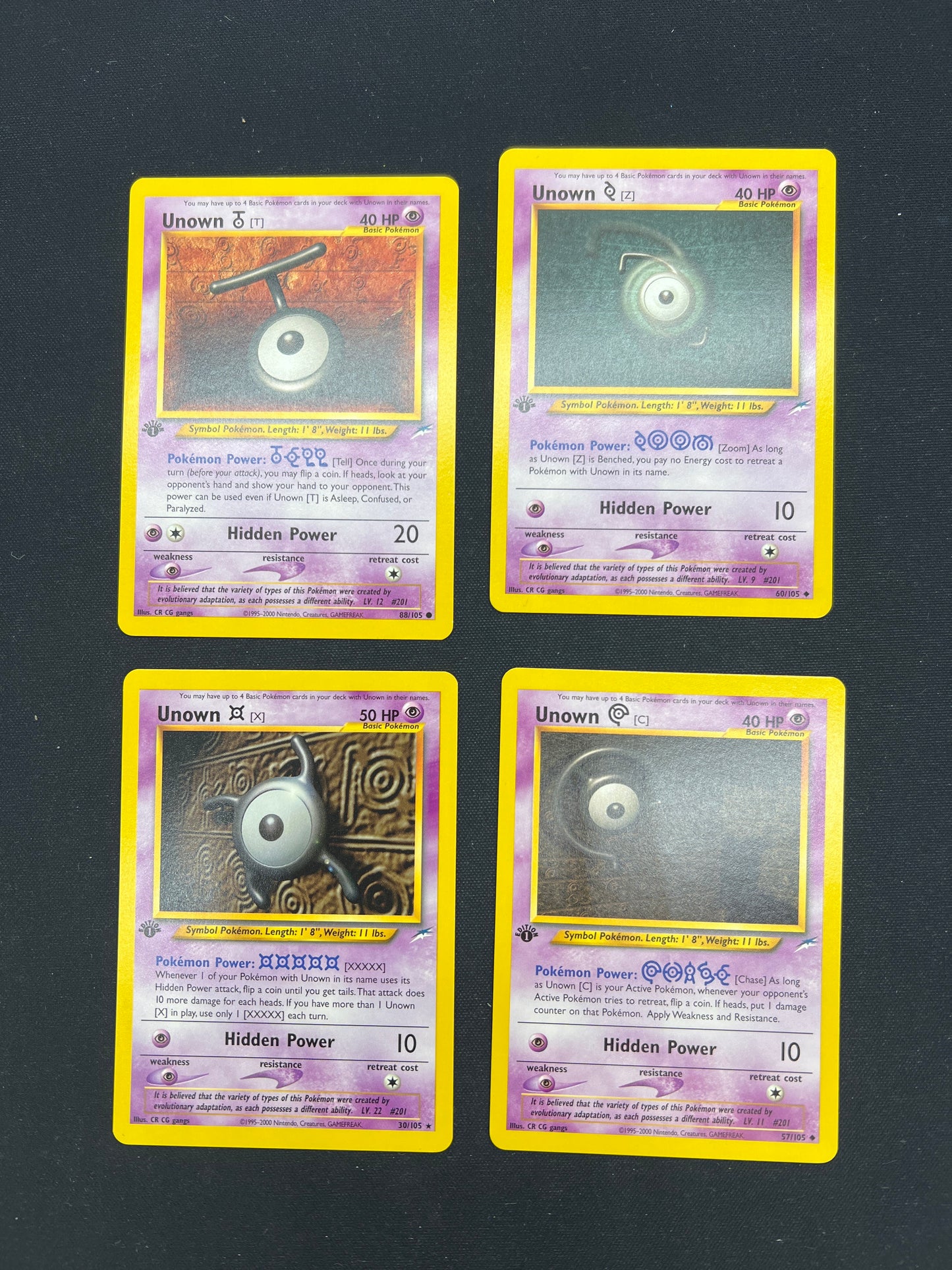 Auction Lot 22: Pokemon Cards Lot of 4 Unown 1st Edition Neo Discovery Conditions Vary