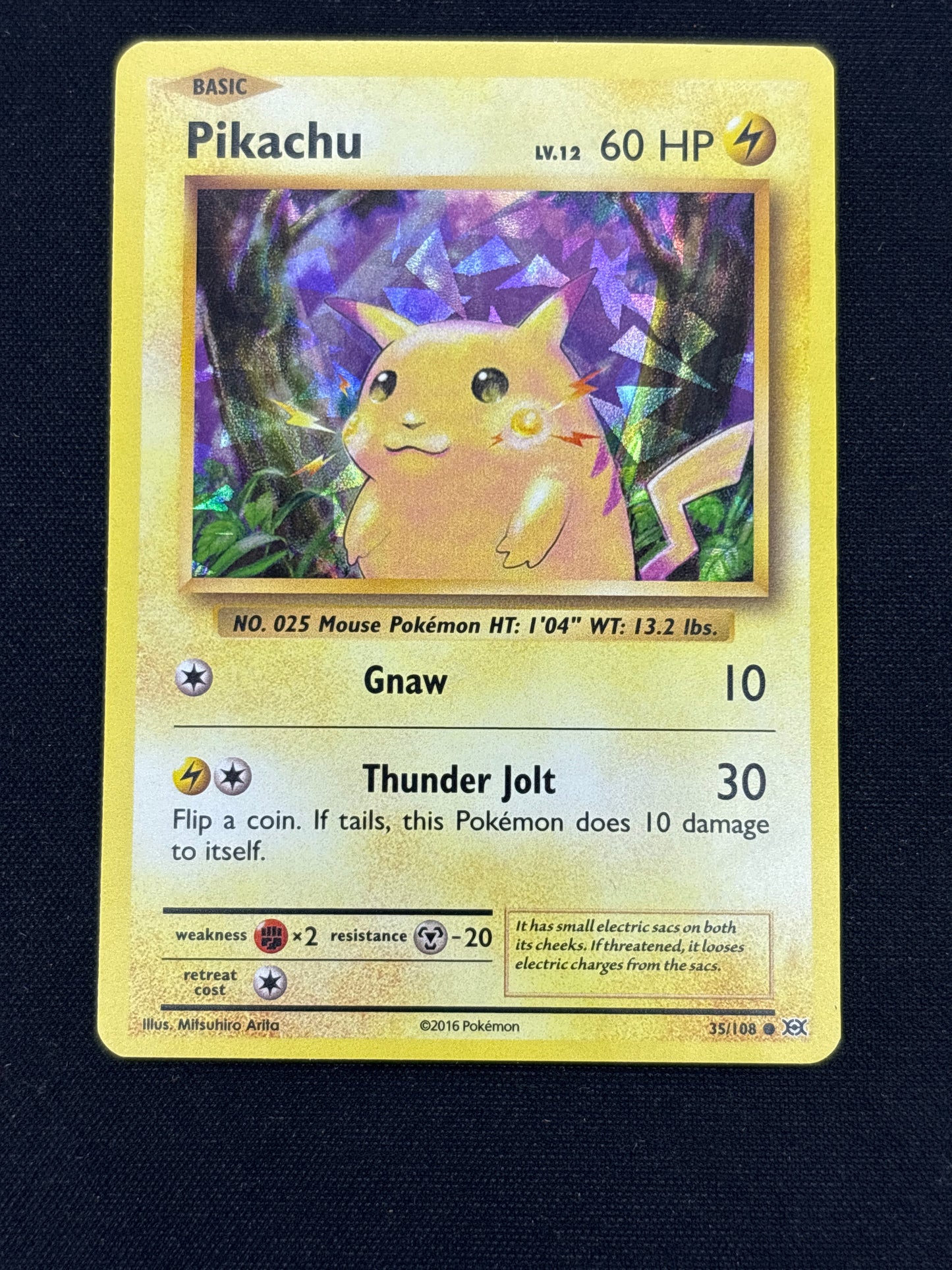 Auction Lot 26: Pikachu Evolutions Cracked Ice Holo Card Conditions Vary