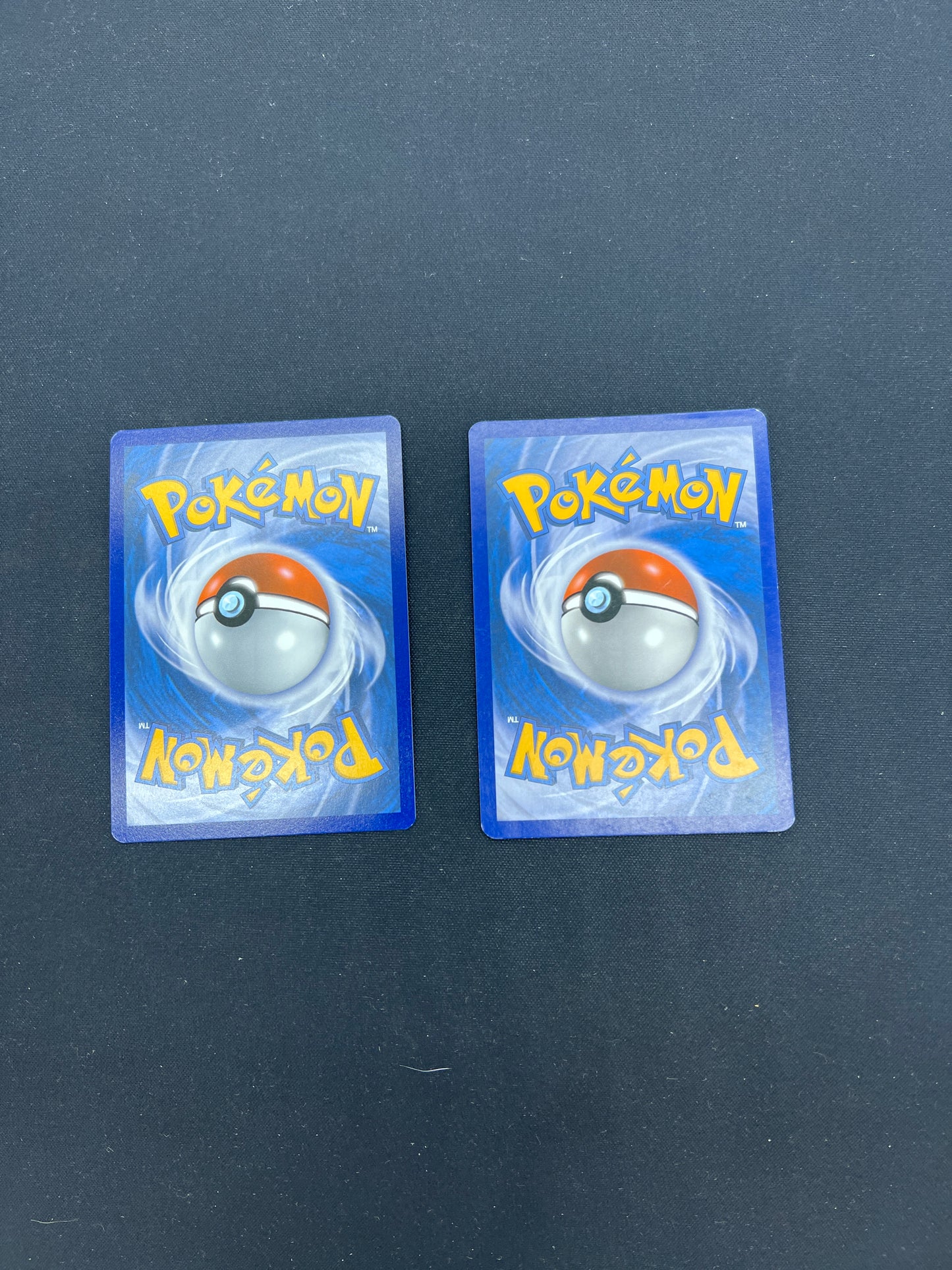 Auction Lot 223: Pokemon Cards Lot of 2 Stamped Holos Conditions Vary