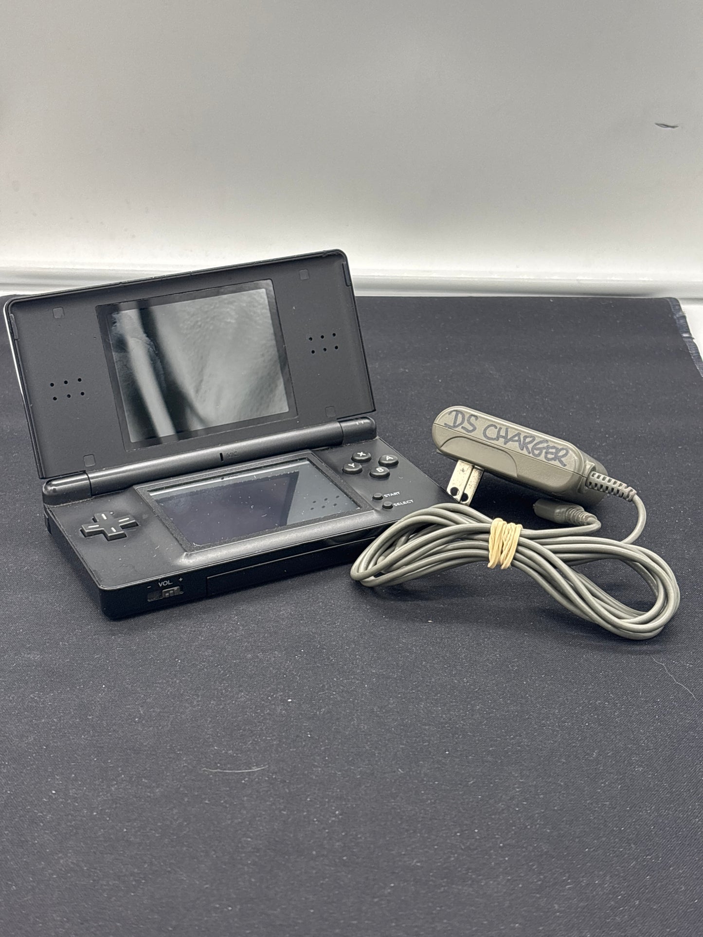 Auction Lot 116: Nintendo DS with Charger (Black)