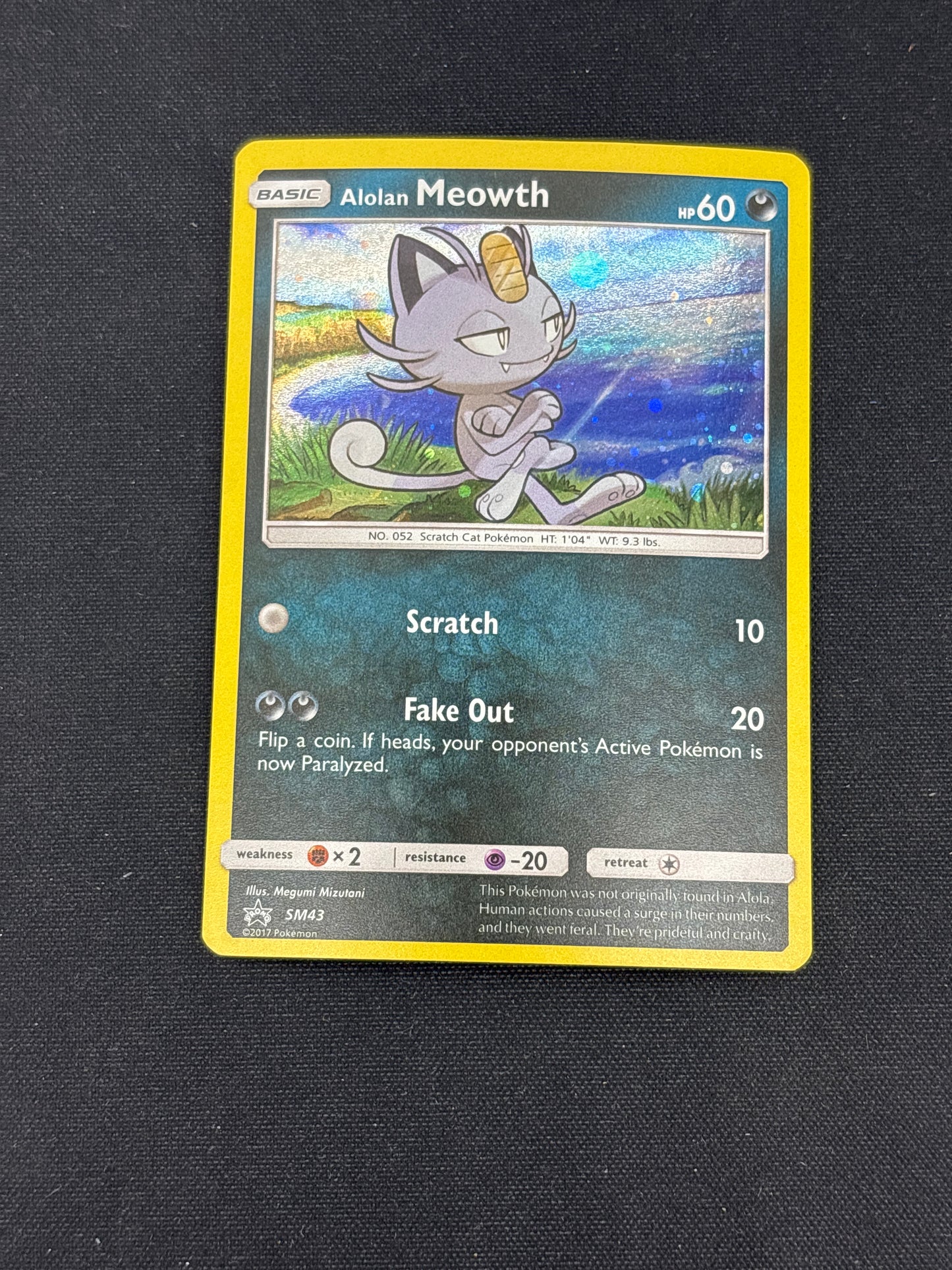 Auction Lot 85: Pokemon Cards Alolan Meowth Cosmo Holo Condition Vary