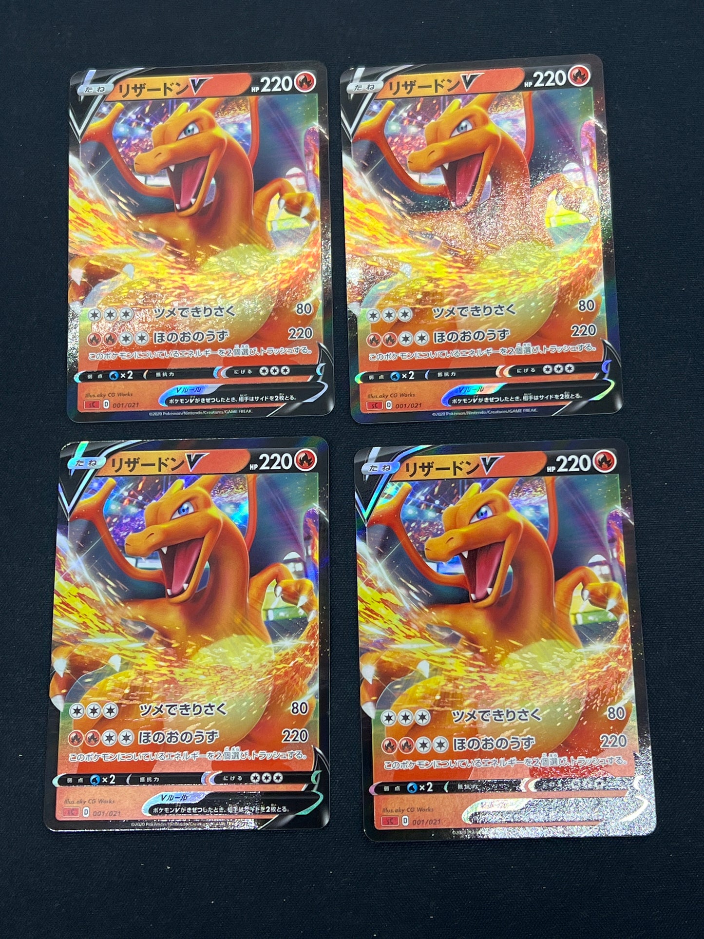Auction Lot 129: Pokemon Cards Lot of 4 Japanese Charizard V Conditions Vary