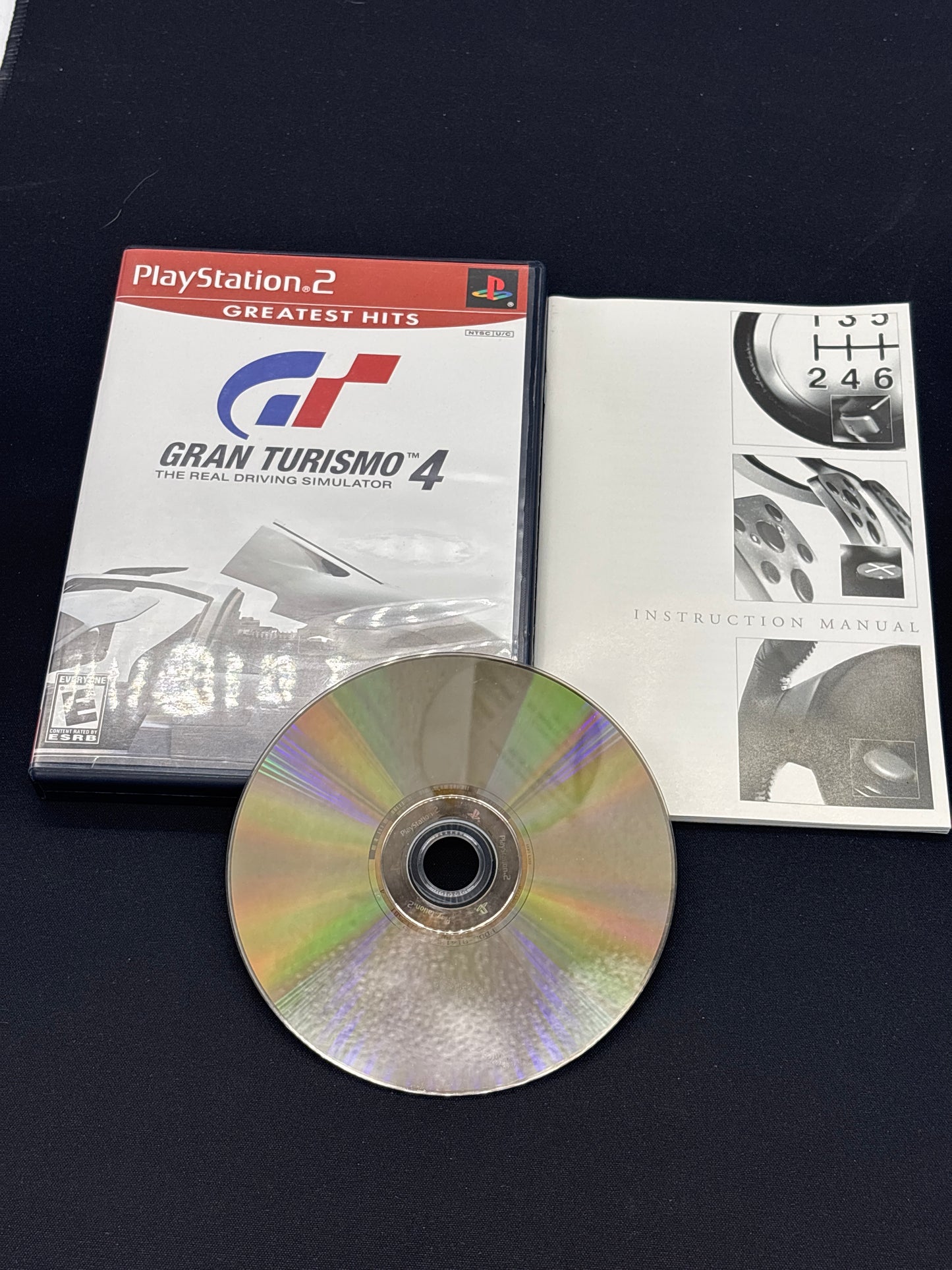 Auction Lot 147: PlayStation 2 Gran Turismo 4 The Real Driving Simulator with Case & Disc