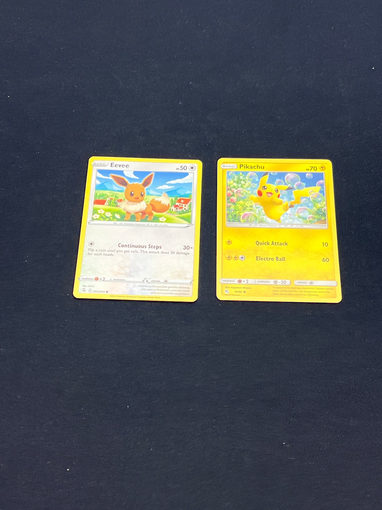 Auction Lot 243: Pokemon Cards Lot of 2 Eevee & Pikachu Conditions Vary