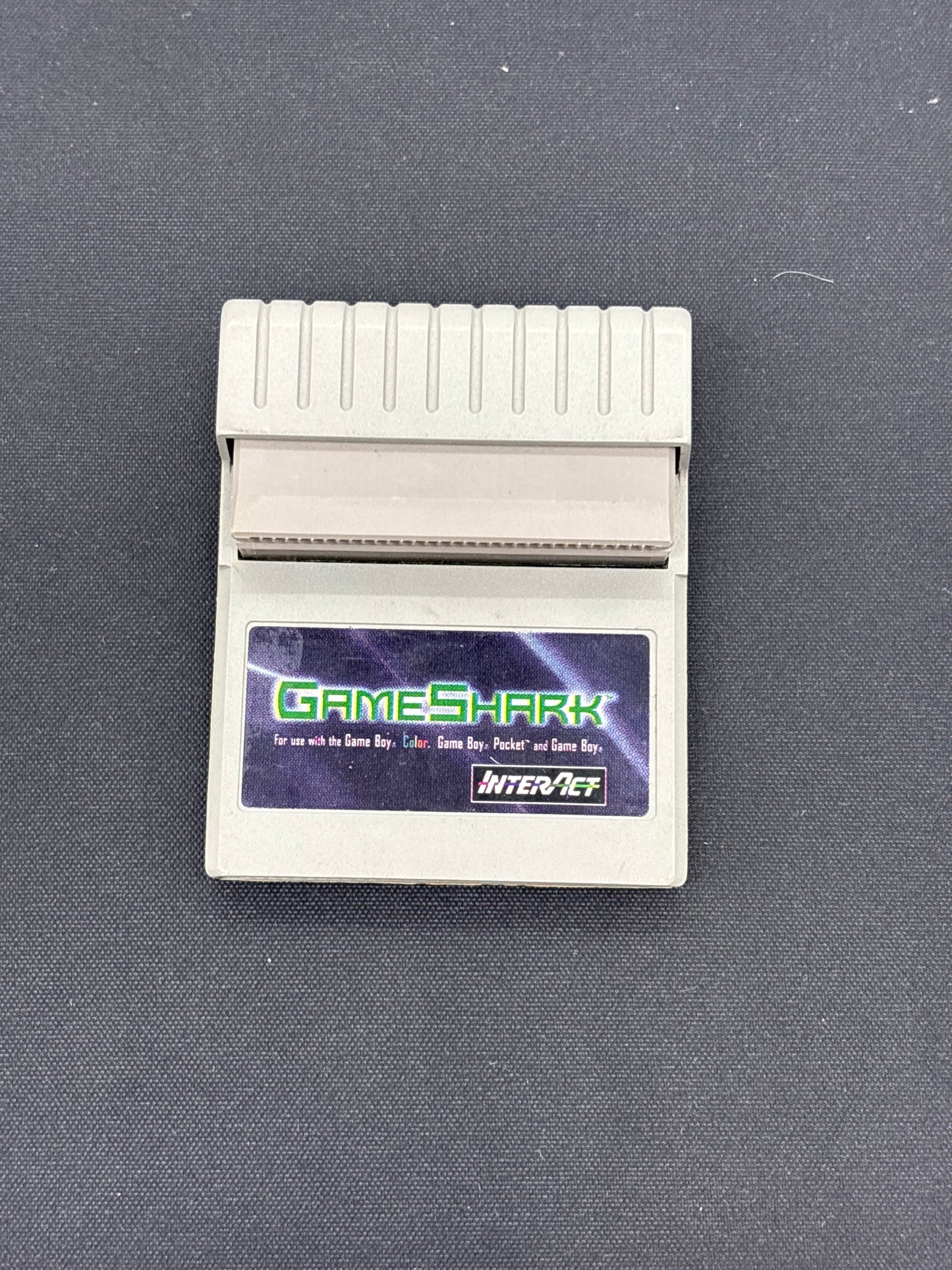 Auction Lot 203: Gameshark Adapter for Nintendo Gameboy Colour Loose