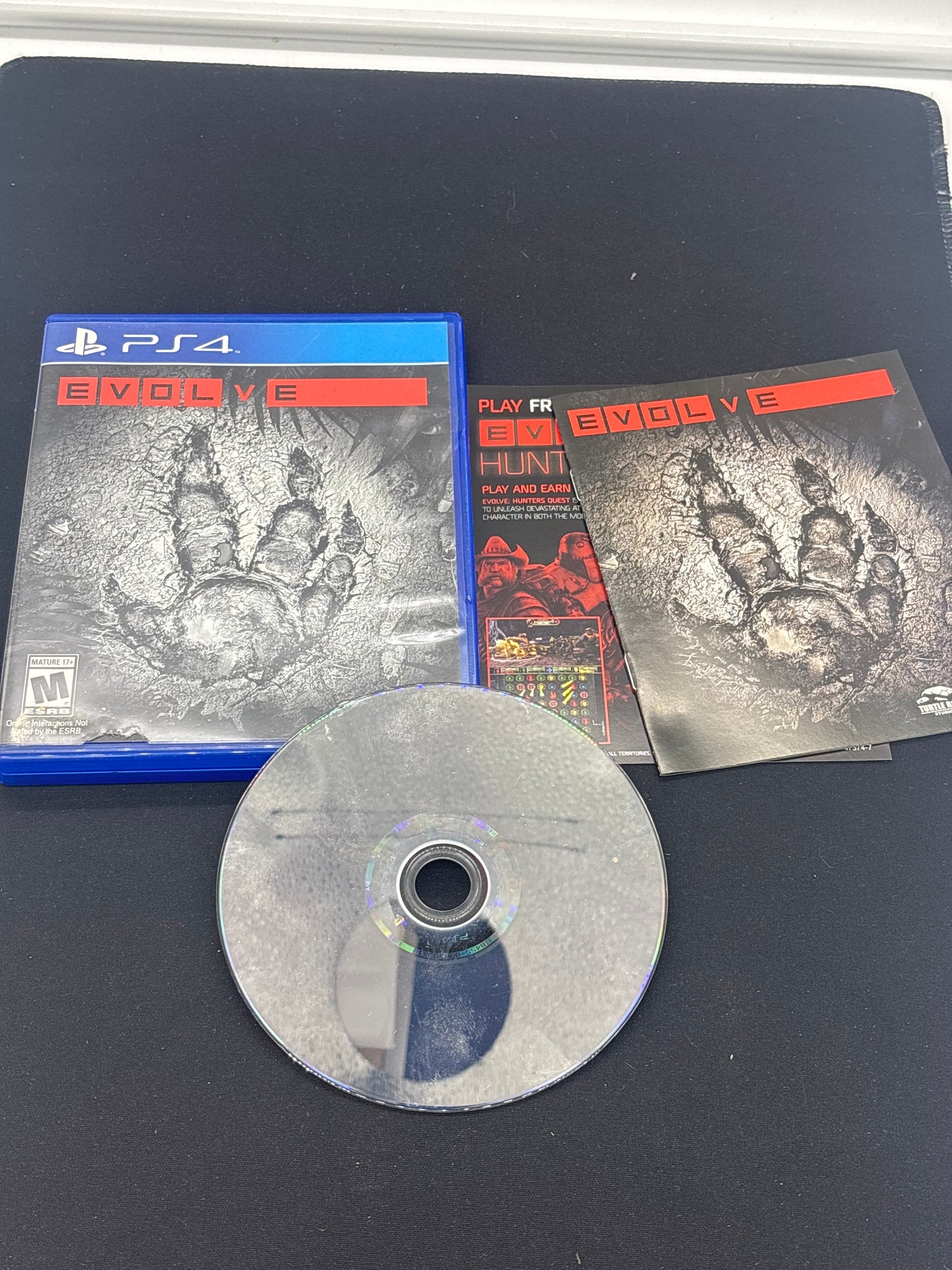 Auction Lot 73: PlayStation 4 Evolve With Case & Disc