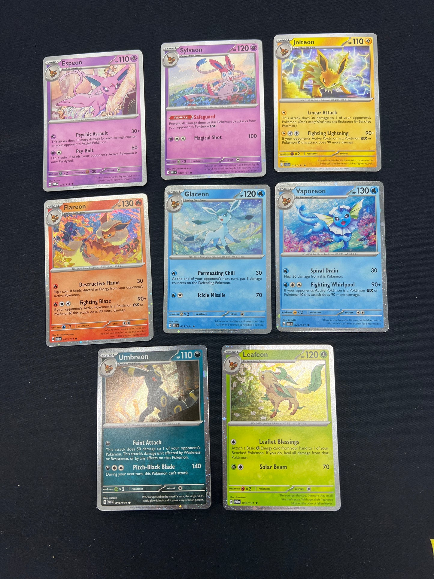 Auction Lot 96: Pokemon Cards Assorted Lot of 8 Eeveelutions Cosmo Holo Rare Conditions Vary