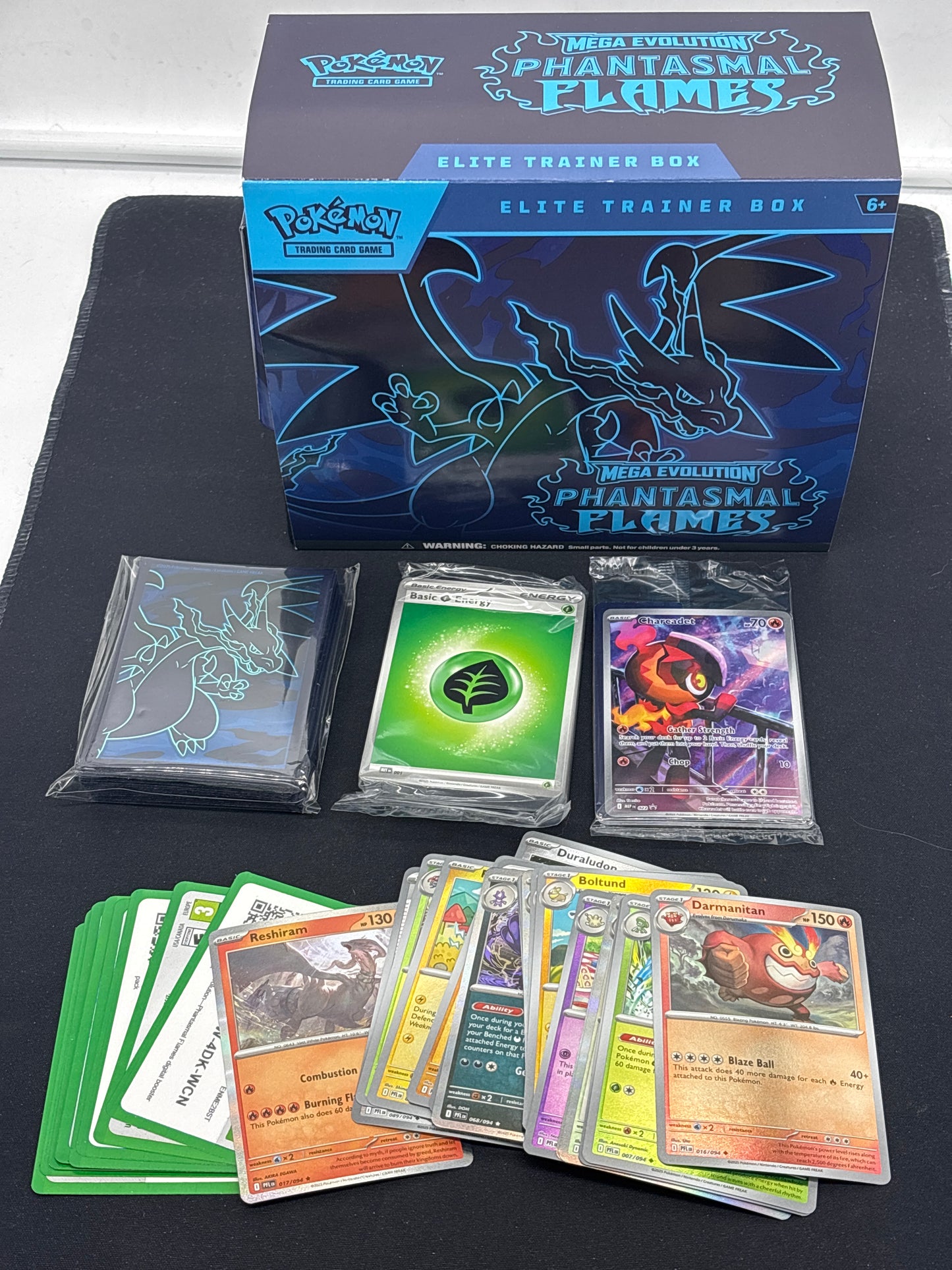 Auction Lot 250: Pokemon Phantasmal Flames EMPTY ETB With Sleeves Energy Cards Charcadet ETB Promo and Reverse Holos Lot Conditions Vary