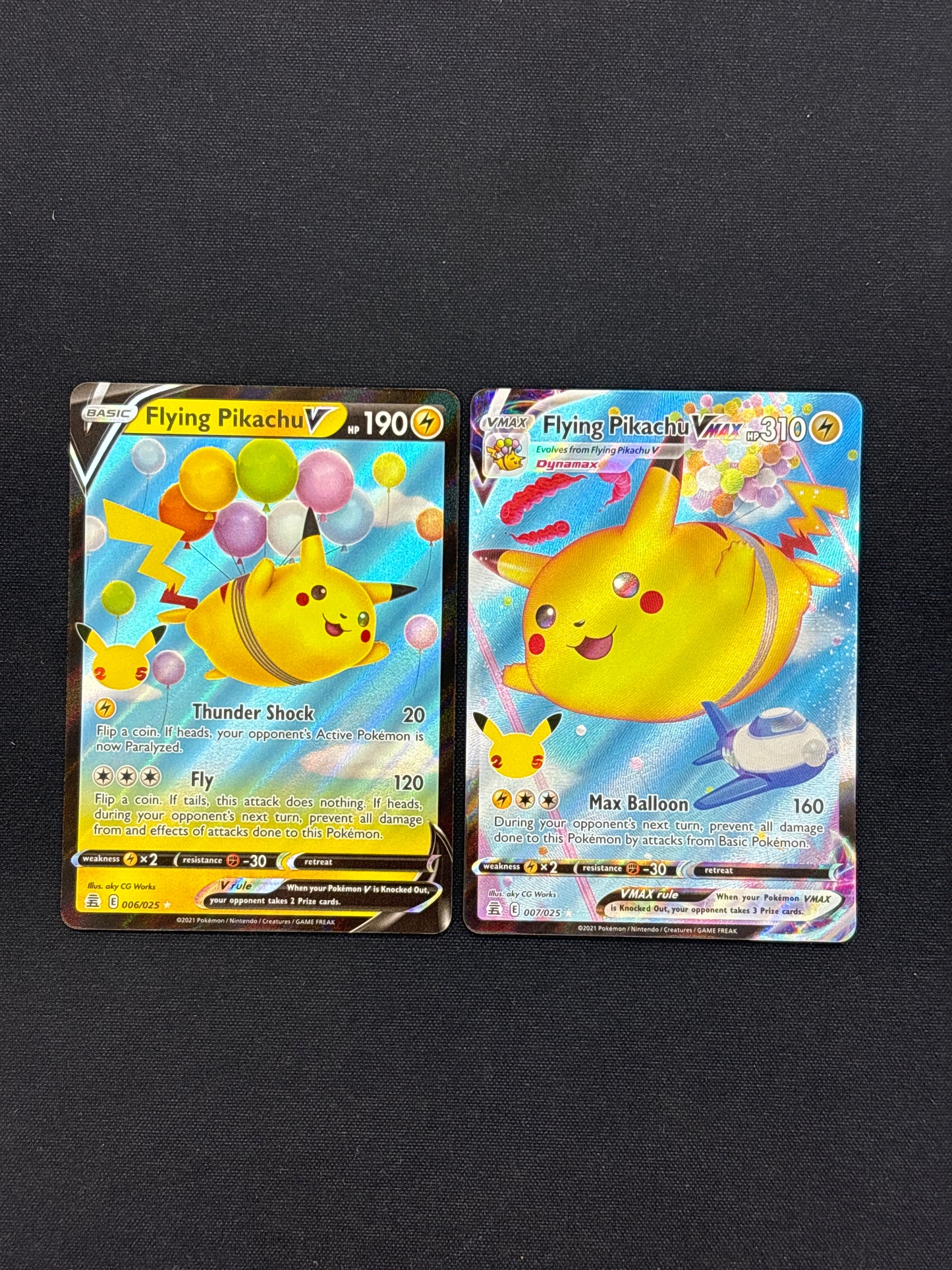 Auction Lot 16: Pokemon Celebrations Flying Pikachu V and VMAX Full Art Card Lot Conditions Vary