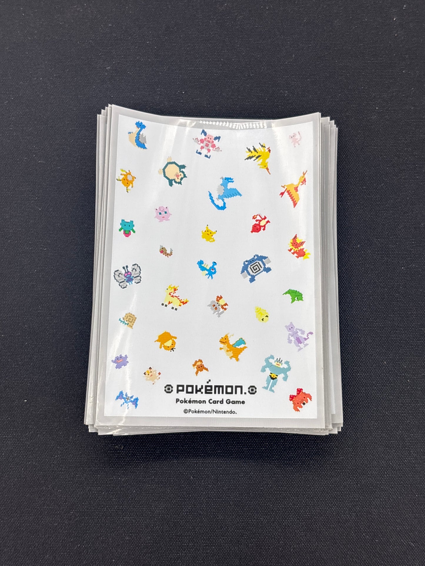 Auction Lot 213: Pokemon Center Exclusive Card Sleeves 55 Count