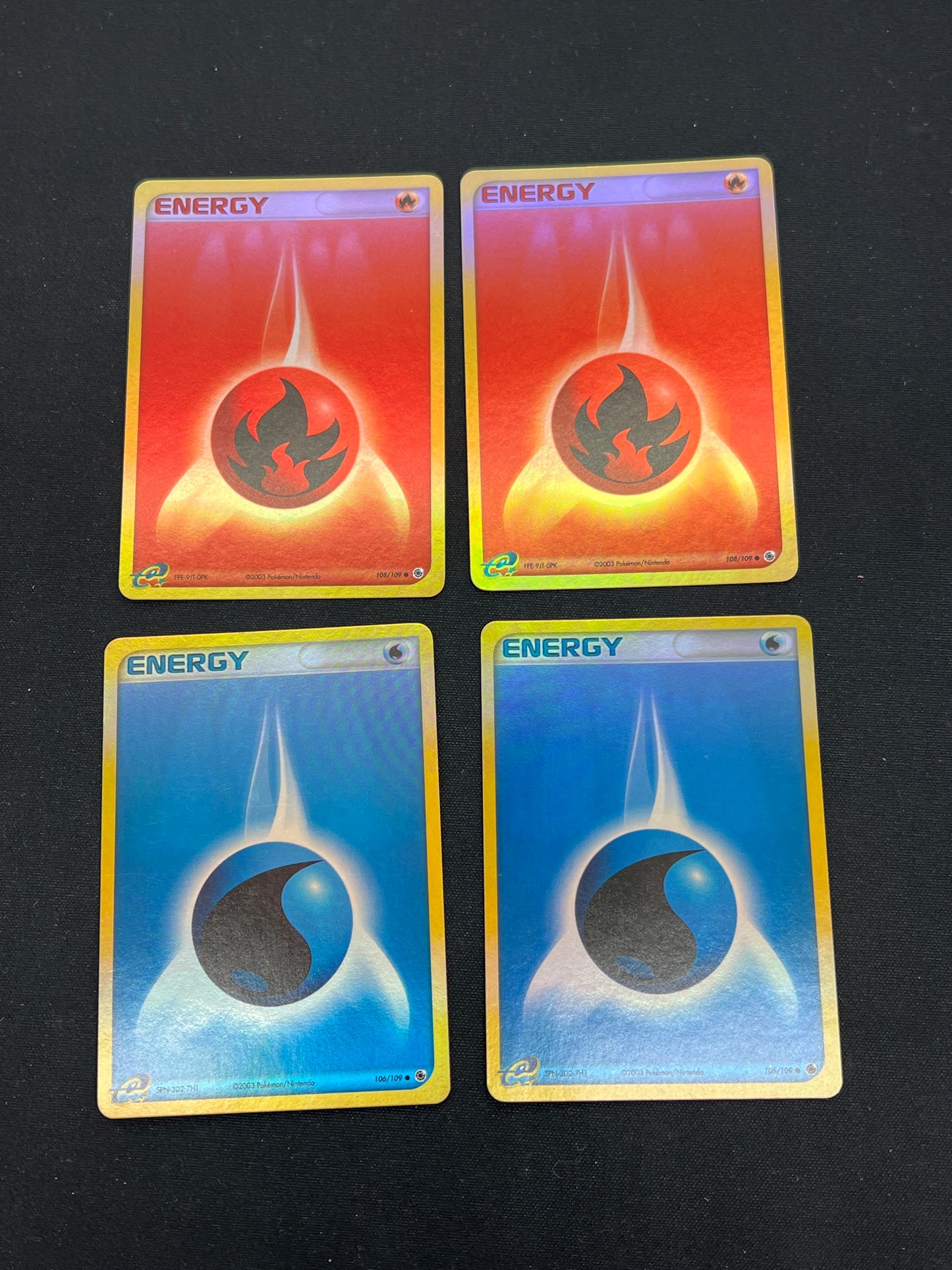 Auction Lot 261: Pokemon Cards Lot of 4 Mid Era Energy Holos Condition Vary