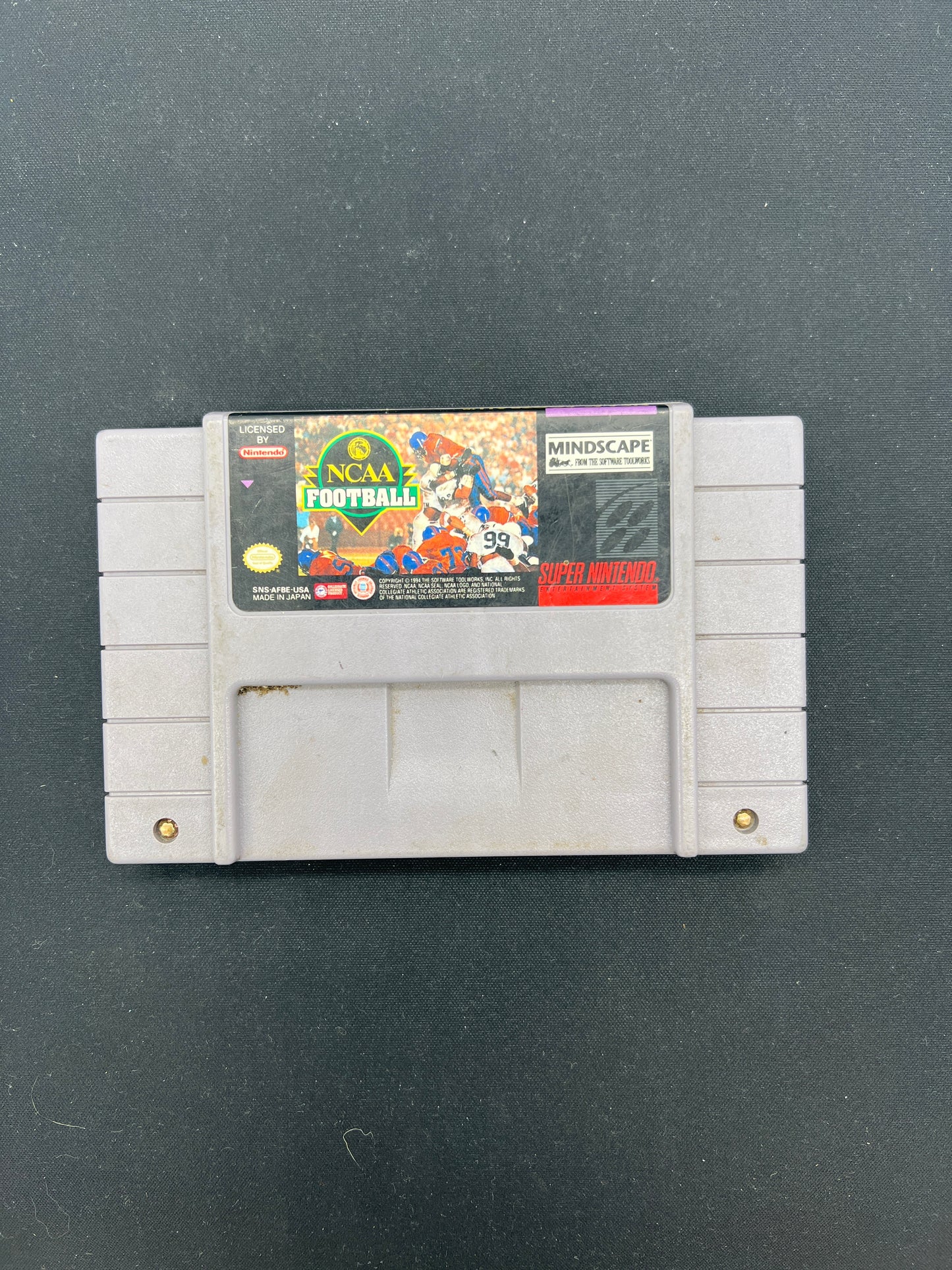 Auction Lot 126: SNES Video Game NCAA Football Loose
