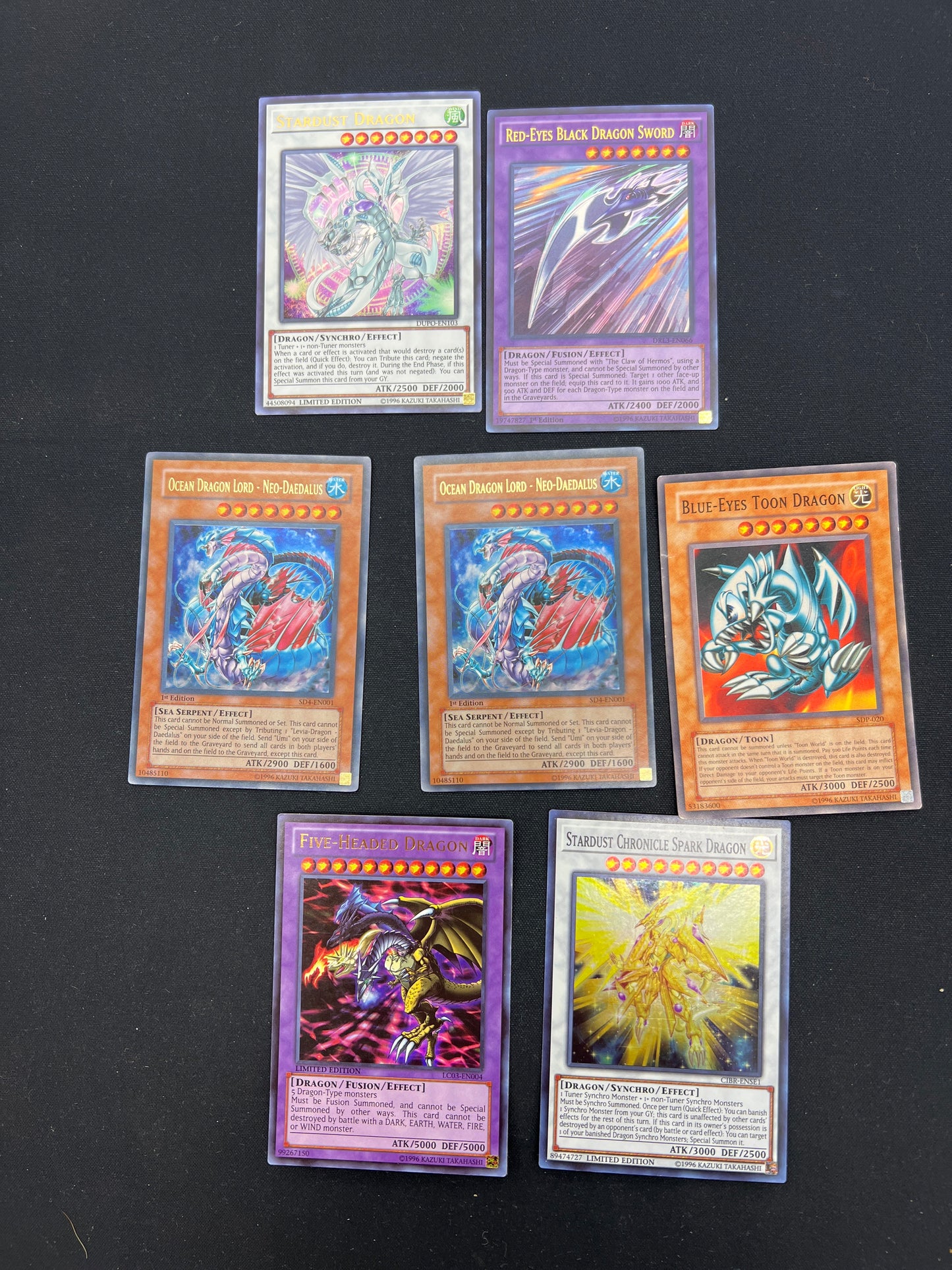 Auction Lot 62: Yugioh TCG Assorted Lot of 8 Holo and Uncommon Conditions Vary