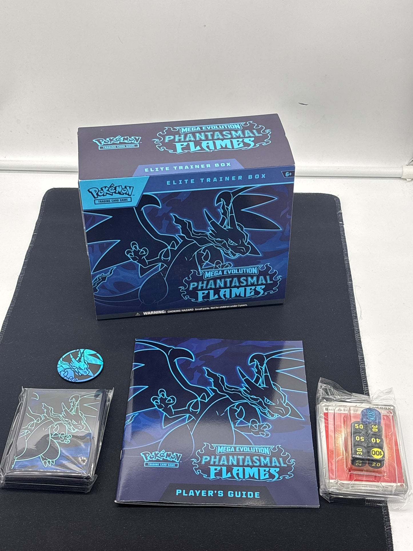 Auction Lot 475: Pokemon EMPTY ETB Phantasmal Flames With Accessories and Sleeves