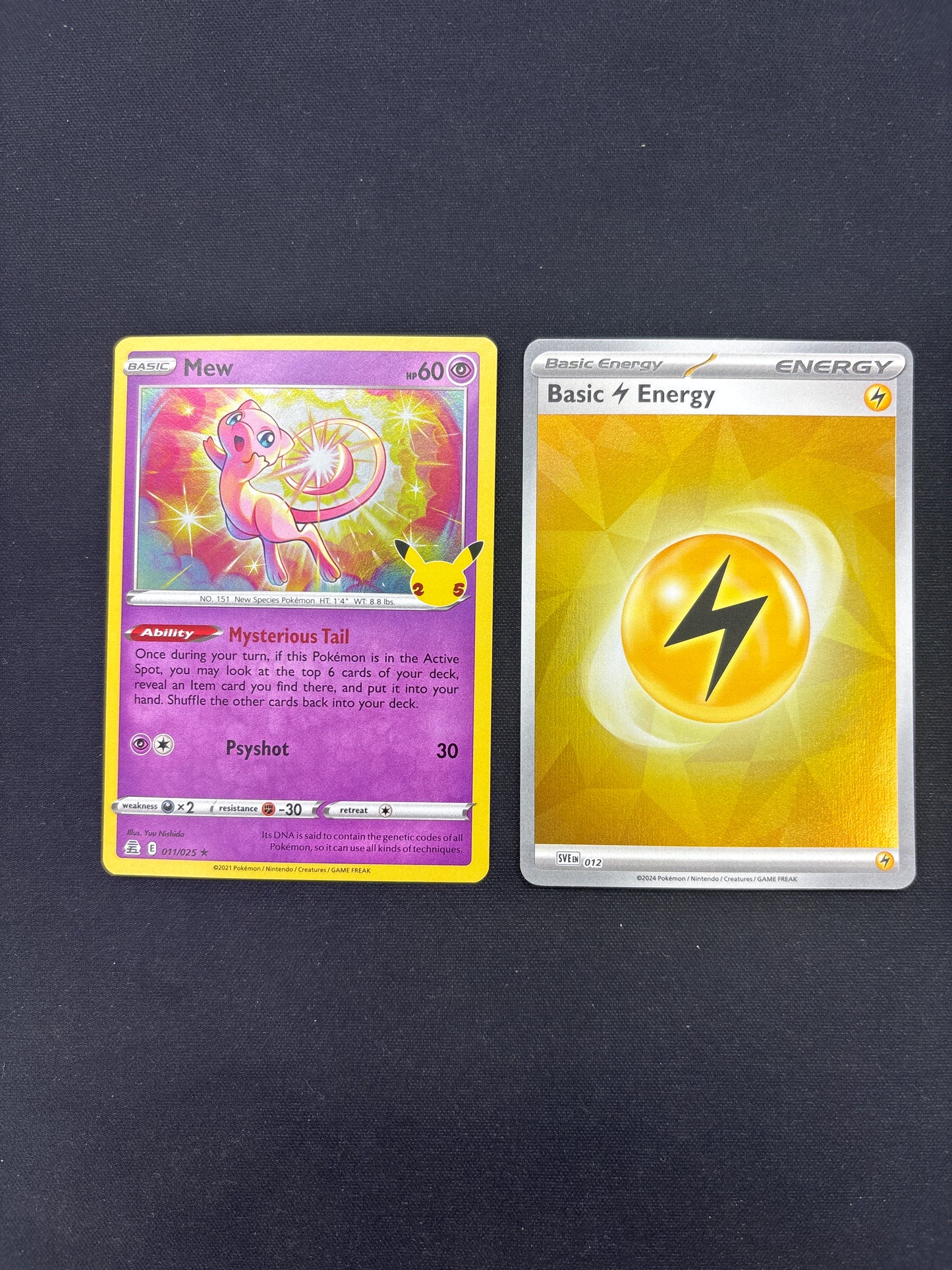 Auction Lot 370: Pokemon Cards Mew Celebrations Holo with Lightning Energy Condition Vary