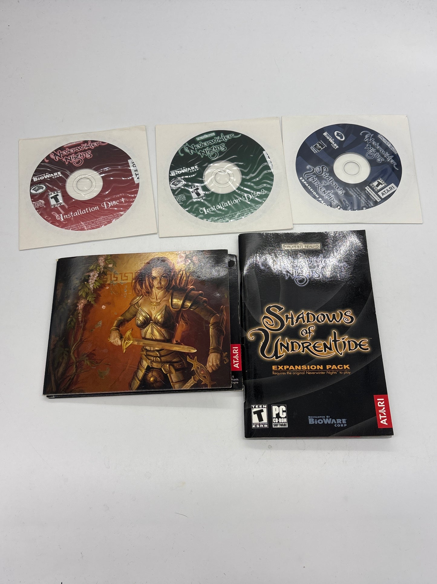 Auction Lot 165: Neverwinter Nights Shadows of Undrentide Expansion and Install Discs Only With Strategy Guide