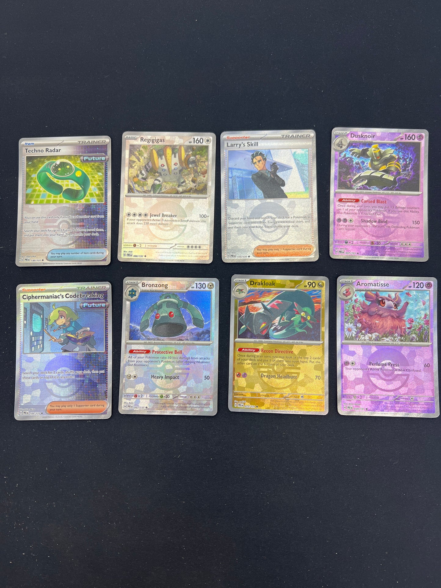 Auction Lot 78: Pokemon Cards Lot of 8 Assorted Prismatic Evolutions Pokeball Patterns Conditions Vary