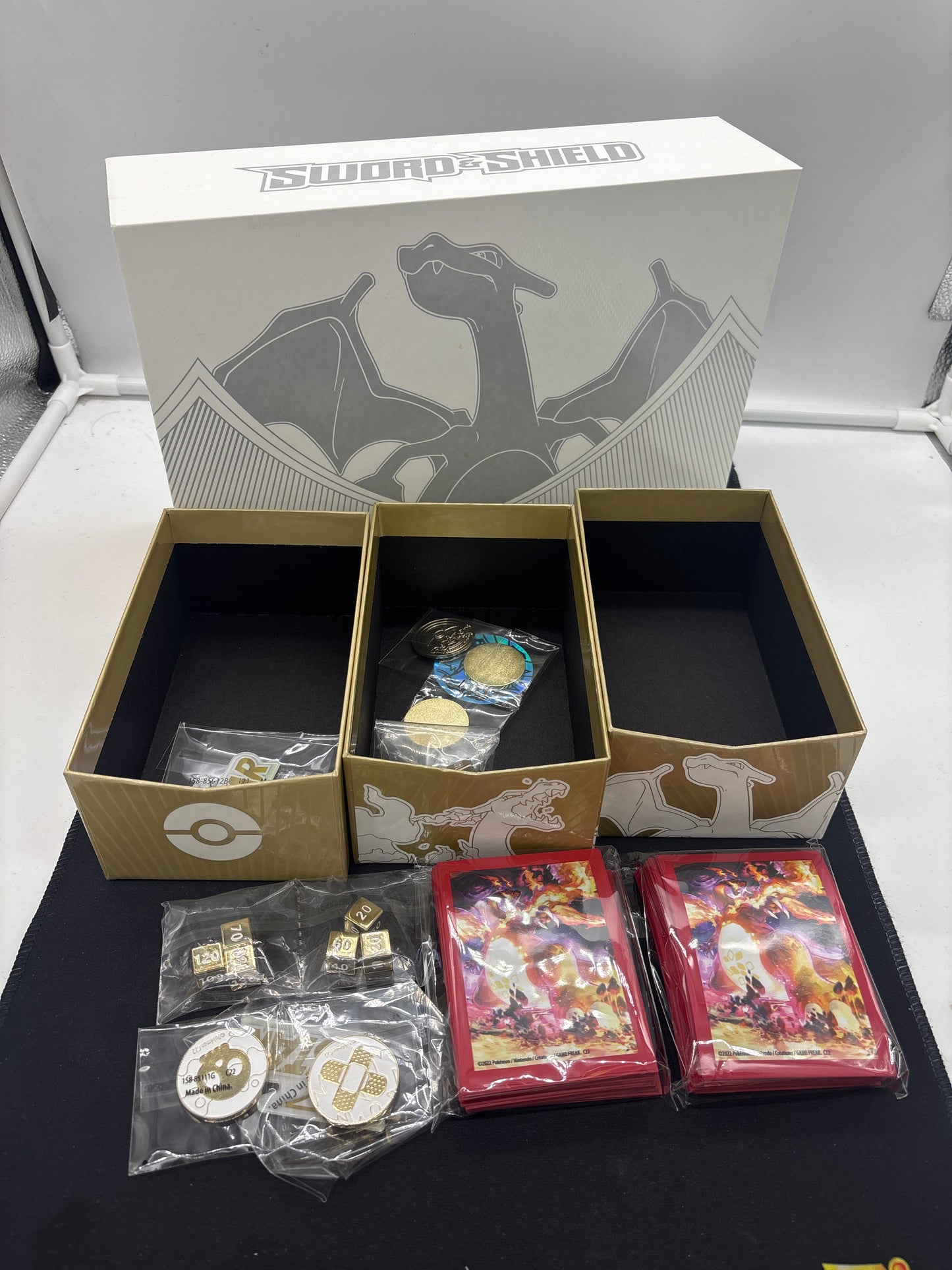 Auction Lot 214: Pokemon SWSH Charizard UPC Empty Box With Accessories