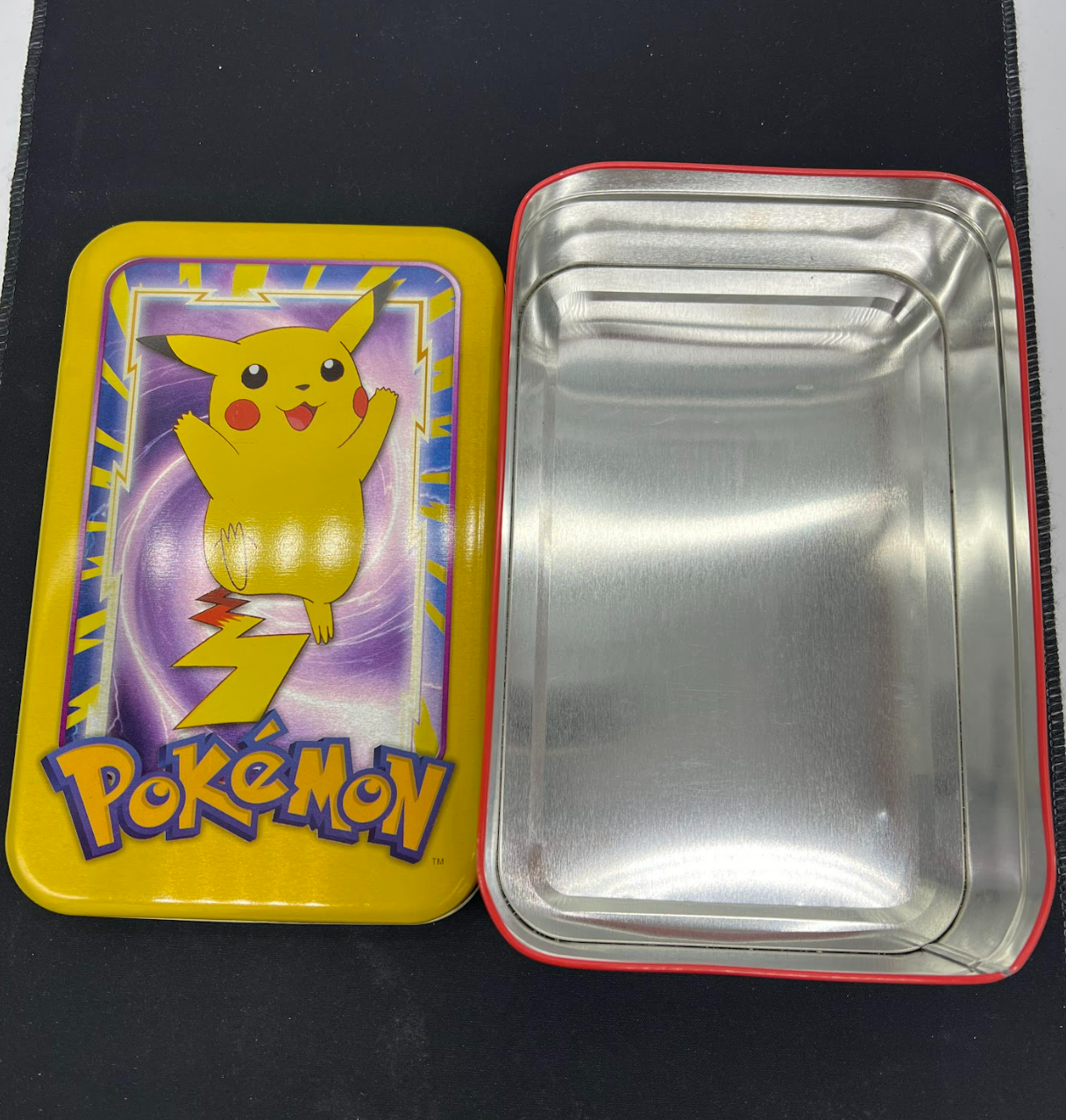 Auction Lot 24: Pokemon Pikachu Tin