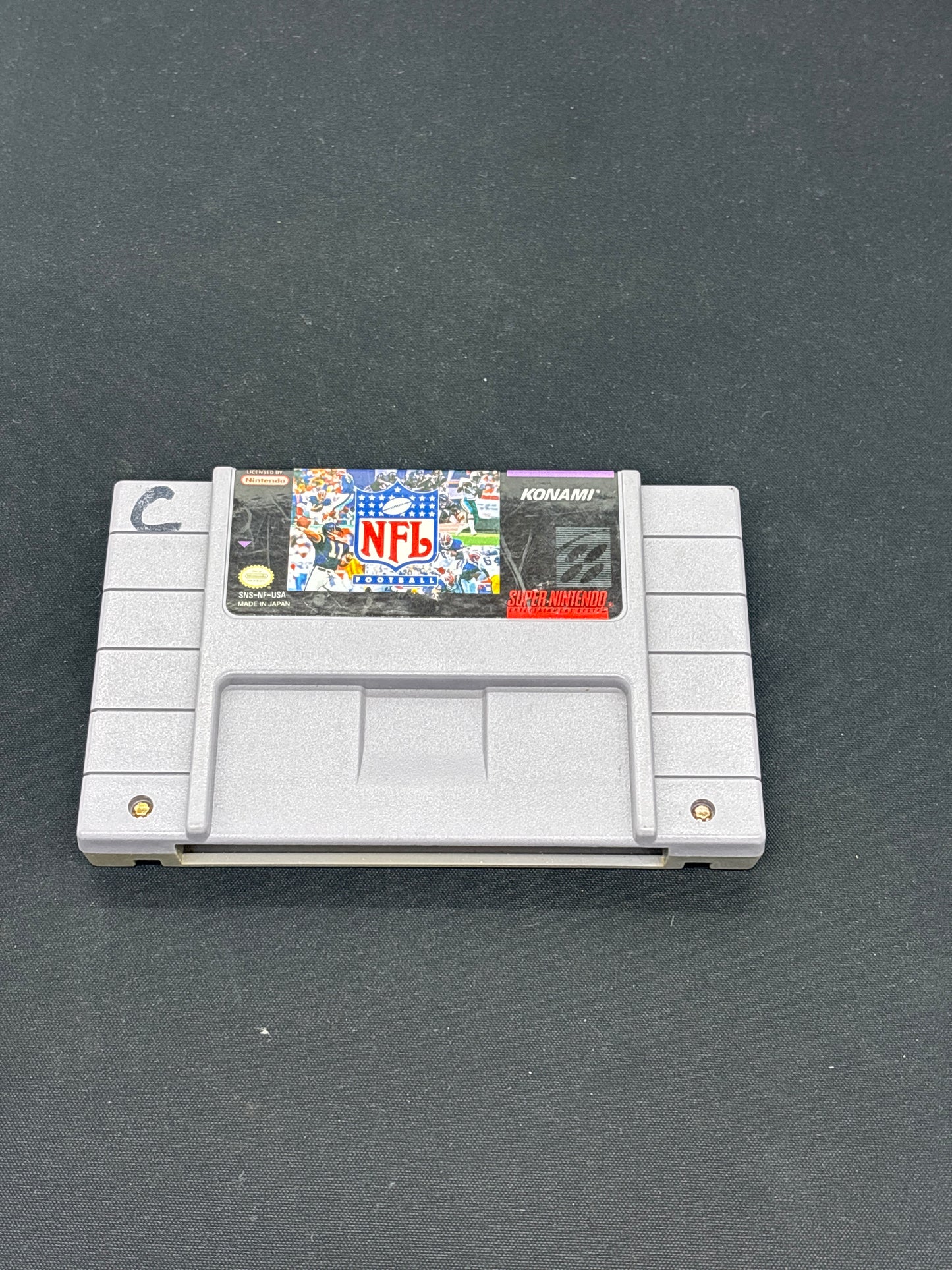 Auction Lot 77: SNES Video Game NFL Football Loose