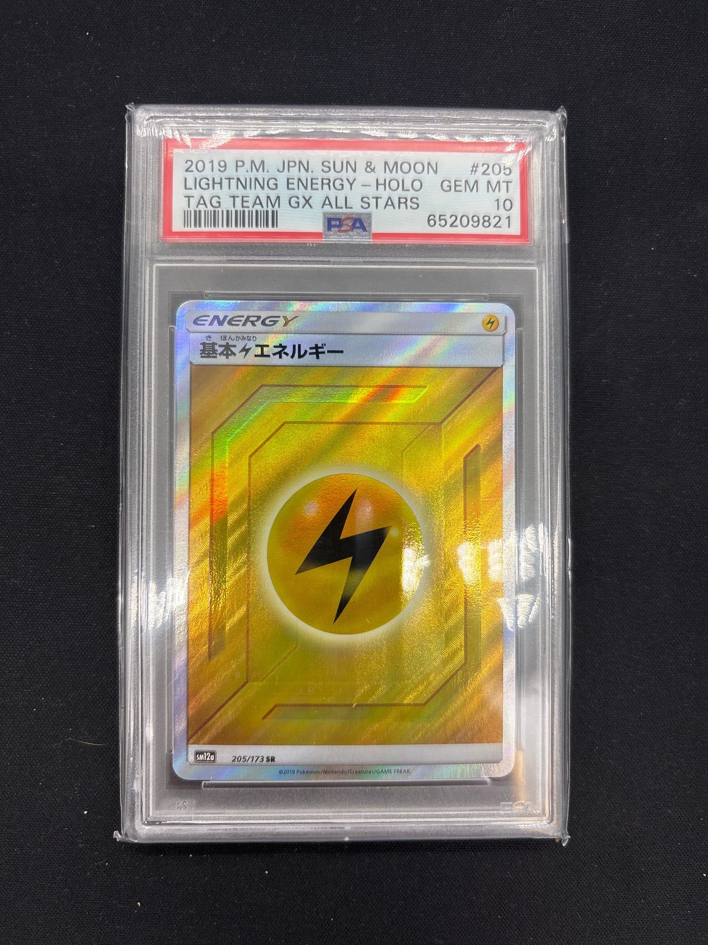 Auction Lot 17: PSA 10 Lightning Energy Holo SM Tag Team All-Stars Japanese