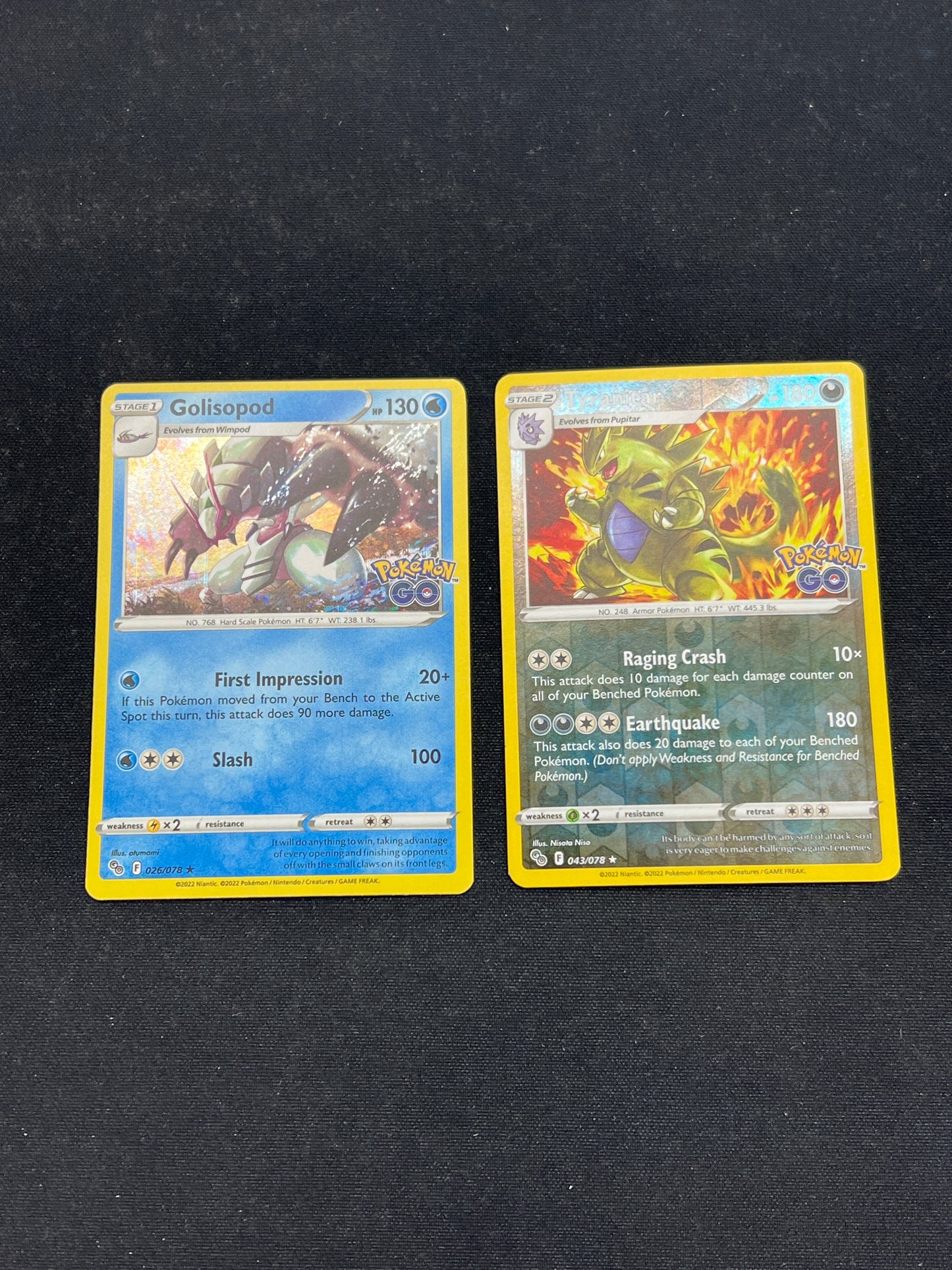 Auction Lot 159: Pokemon Cards Golisopod & Tyranitar Holos Stamped Pokemon GO Conditions Vary