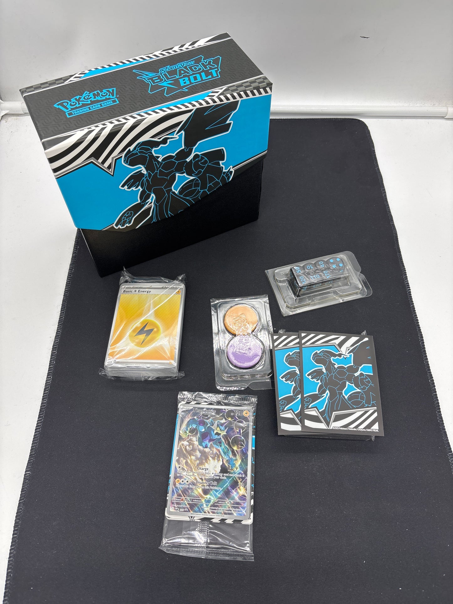 Auction Lot 136: Pokemon SV Black Bolt ETB with Promo Card and Accessories
