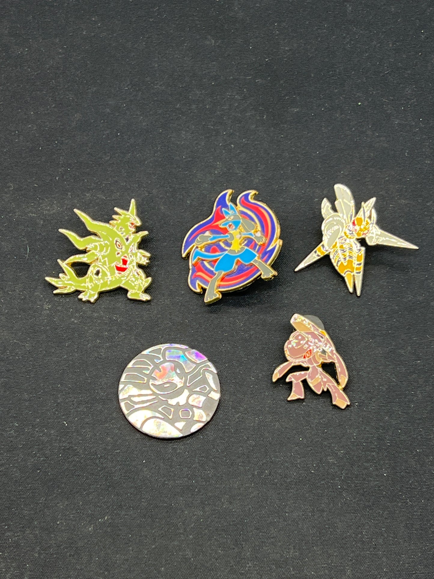 Auction Lot 250: Pokemon Themed Pins and Coin