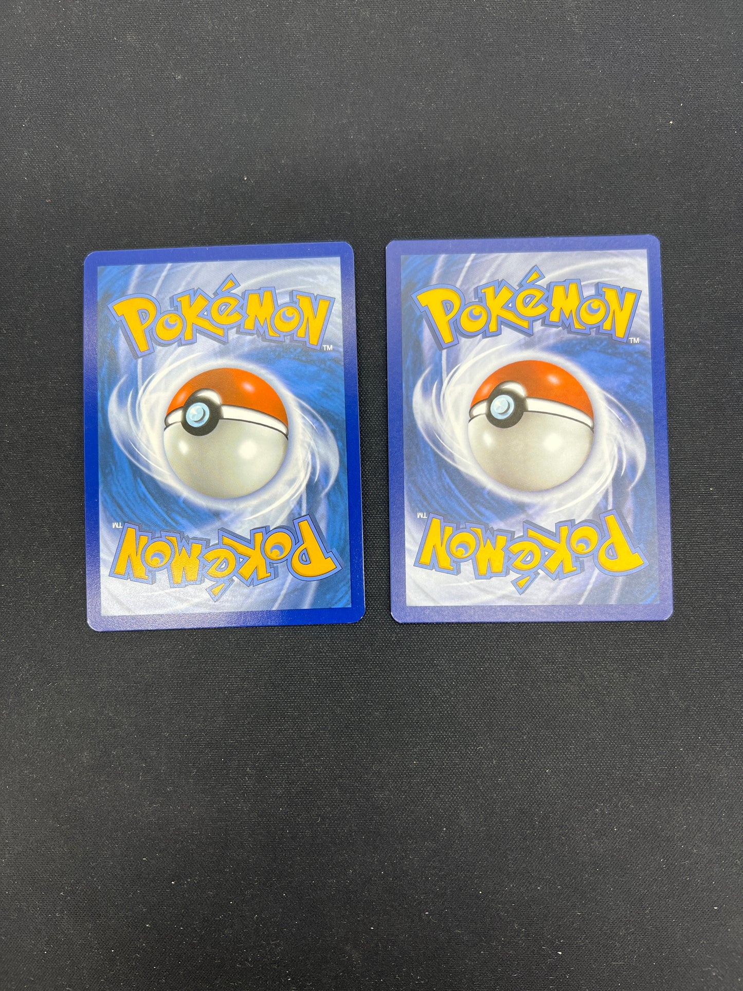 Auction Lot 97: Pokemon Cards Mew Holo Celebrations and Lightning Energy Holo Conditions Vary
