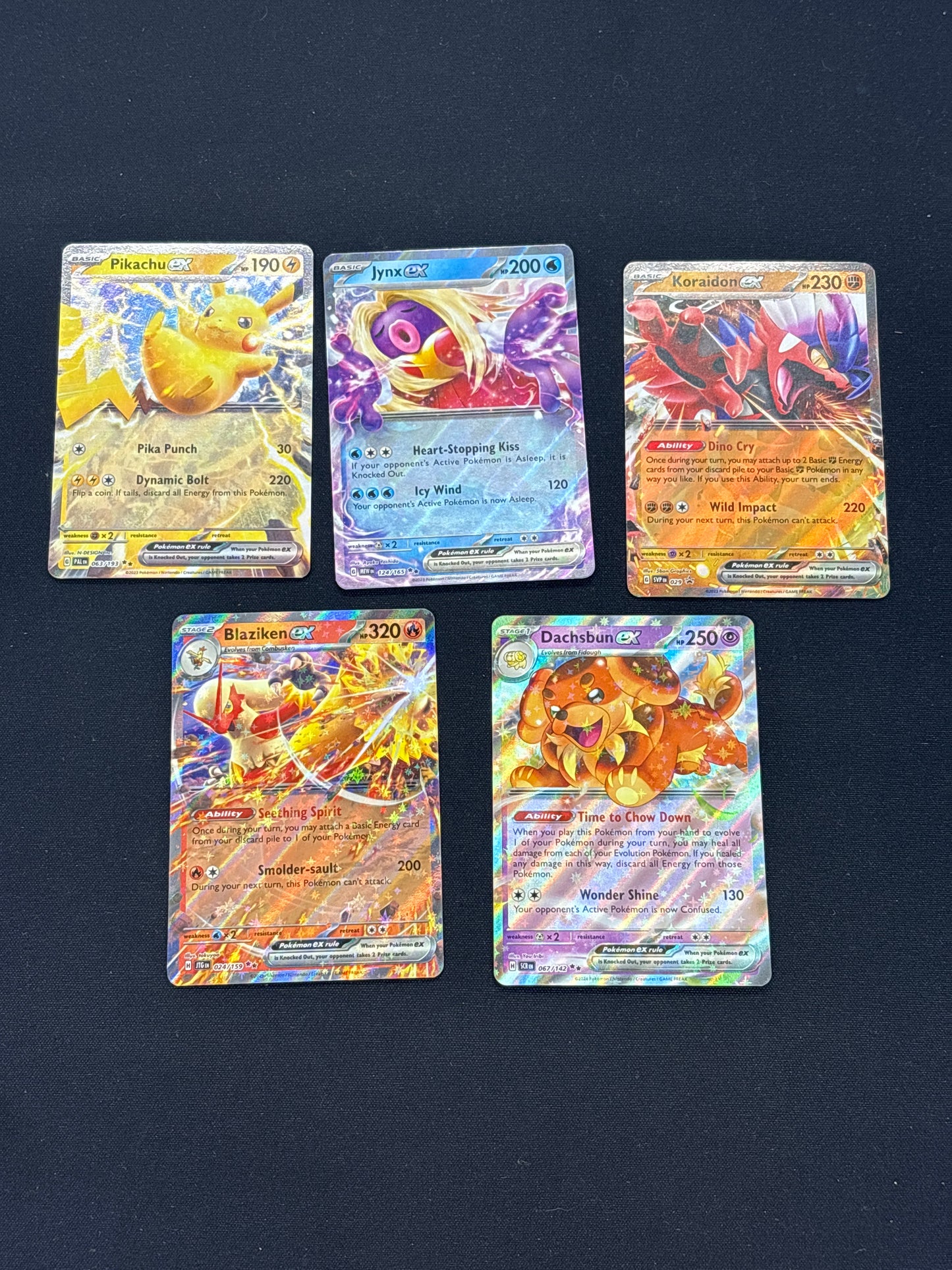 Auction Lot 321: Pokemon SV EX Card Lot Conditions Vary