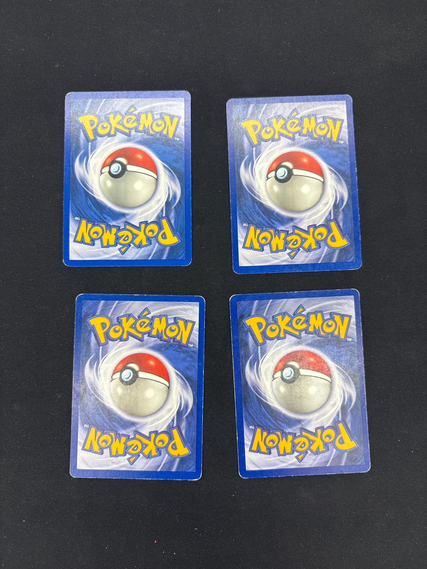Auction Lot 87: Pokemon Fossil and Team Rocket Card Lot Conditions Vary