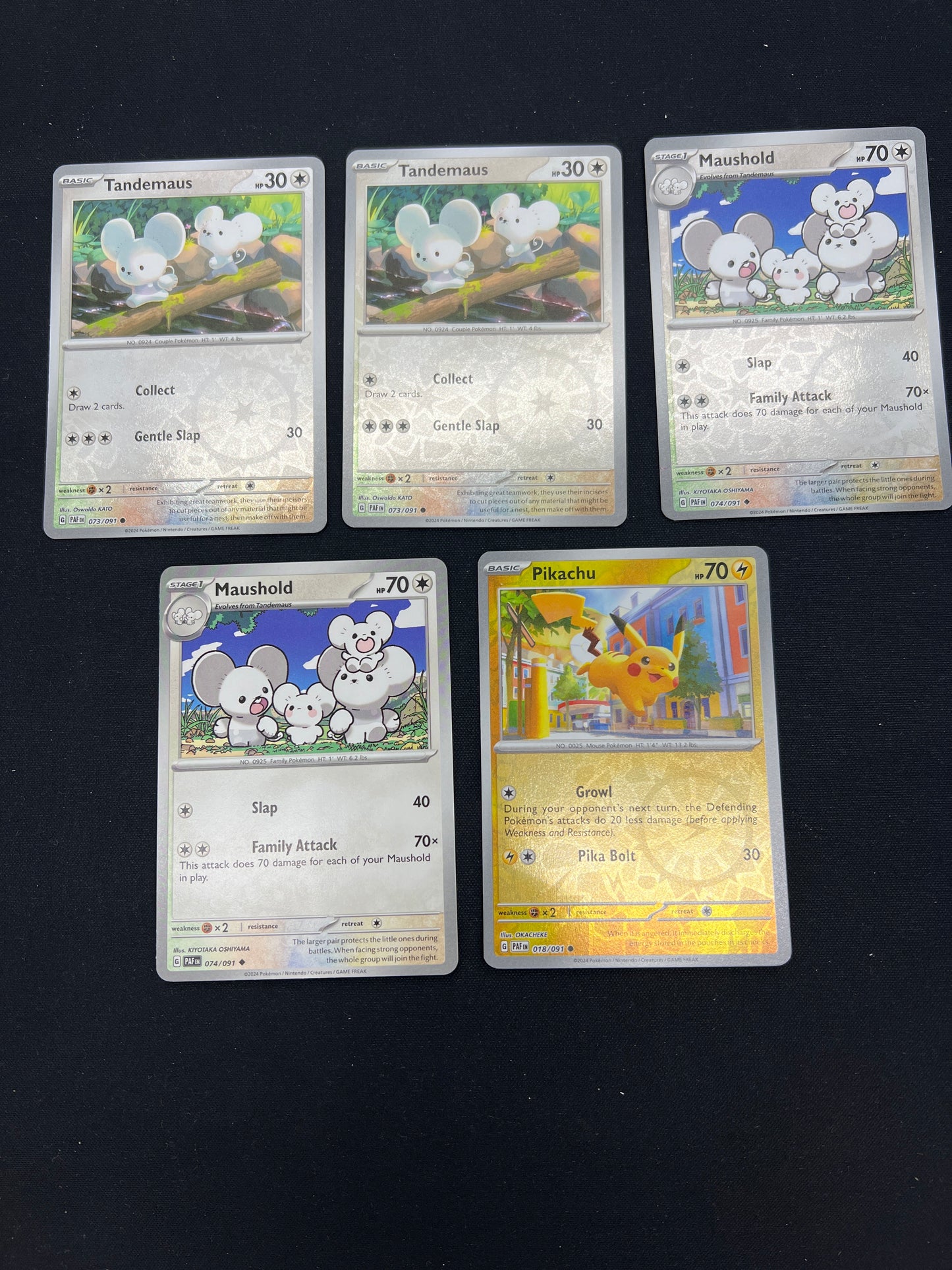 Auction Lot 243: Pokemon Cards Lot of 5 Tandemaus Maushold and Pikachu Reverse Holo Lot Conditions Vary