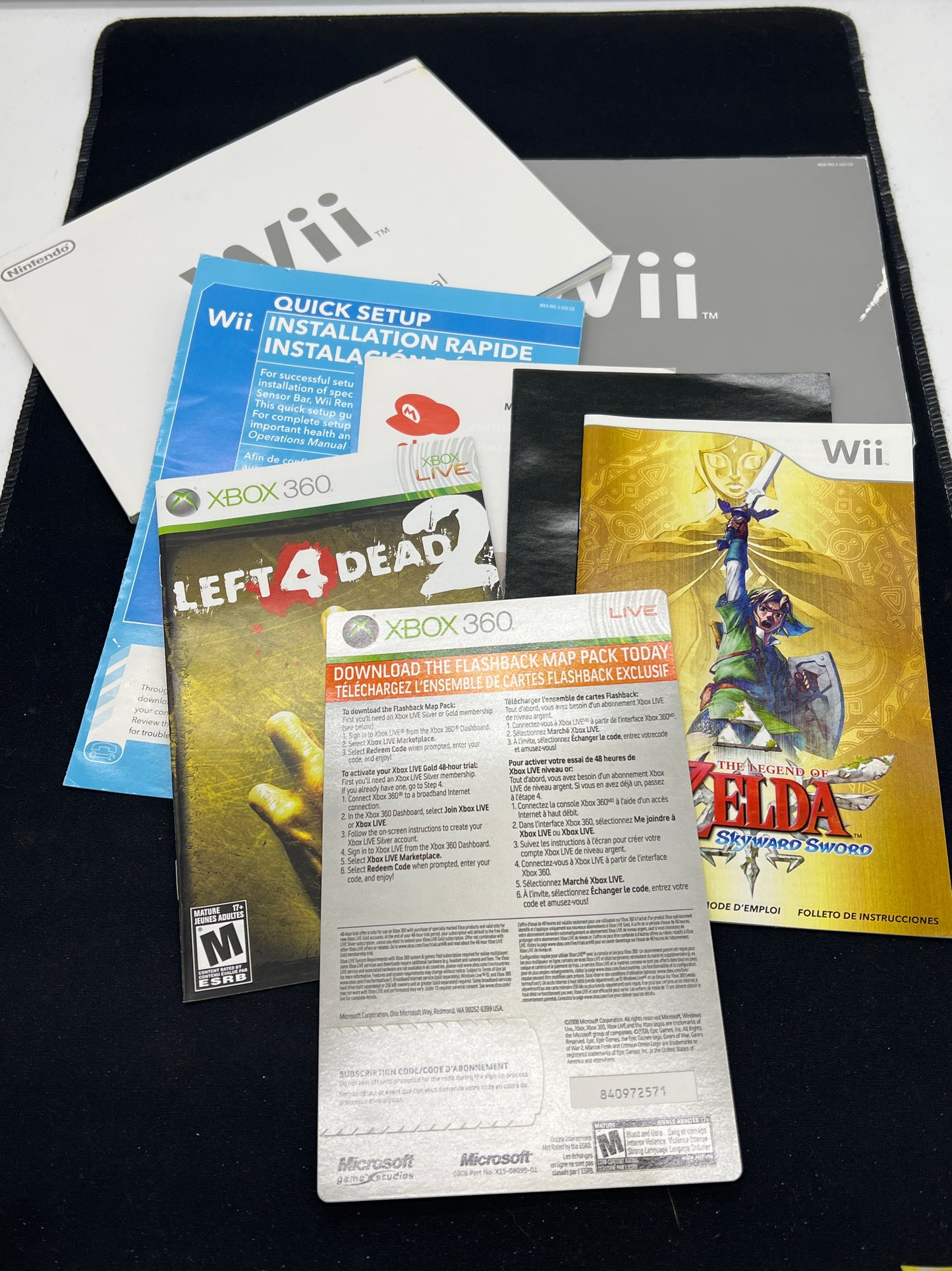Auction Lot 105: Assorted Wii & XBOX 360 Game Manuals