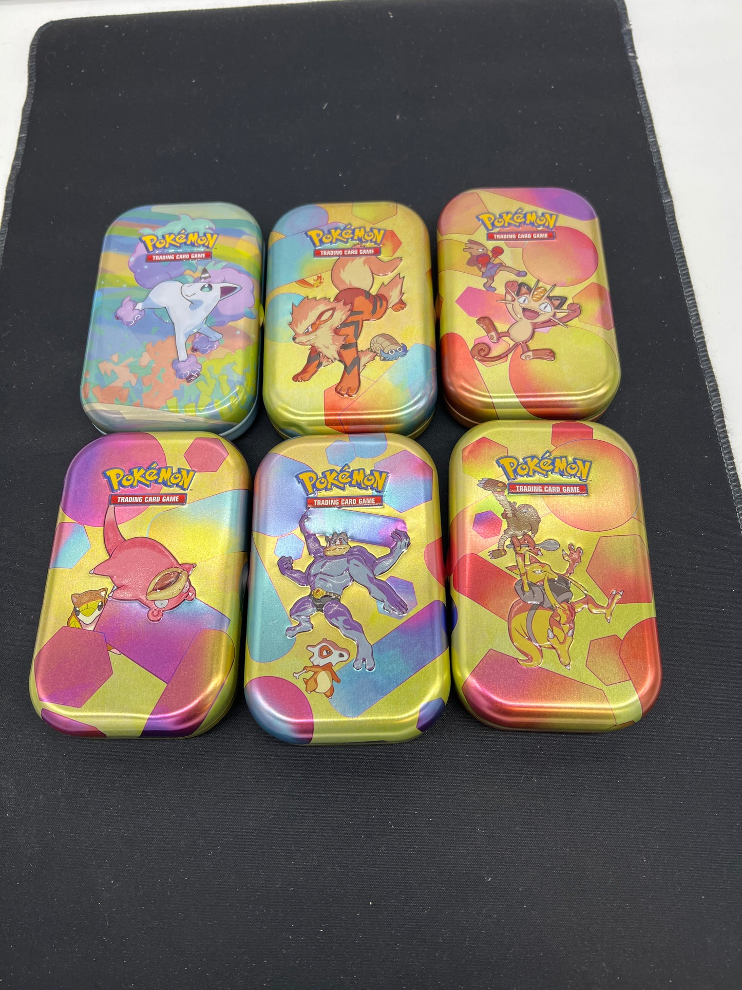 Auction Lot 217: Pokemon Assorted Lot of 151 and Galarian Ponyta EMPTY Tin Lot